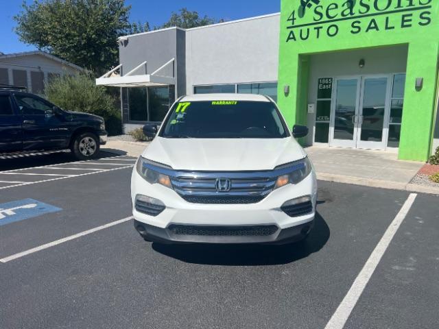2017 White Diamond Pearl /Black Honda Pilot LX (5FNYF5H14HB) with an 3.5L V-6 gasoline direct injection engine, Automatic transmission, located at 940 North Main Street, Cedar City, UT, 84720, (435) 628-0023, 37.692936, -113.061897 - We specialize in helping ALL people get the best financing available. No matter your credit score, good, bad or none we can get you an amazing rate. Had a bankruptcy, divorce, or repossessions? We give you the green light to get your credit back on the road. Low down and affordable payments that fit - Photo#1