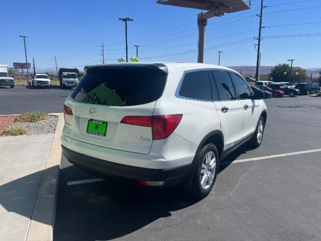 2017 White Diamond Pearl /Black Honda Pilot LX (5FNYF5H14HB) with an 3.5L V-6 gasoline direct injection engine, Automatic transmission, located at 940 North Main Street, Cedar City, UT, 84720, (435) 628-0023, 37.692936, -113.061897 - We specialize in helping ALL people get the best financing available. No matter your credit score, good, bad or none we can get you an amazing rate. Had a bankruptcy, divorce, or repossessions? We give you the green light to get your credit back on the road. Low down and affordable payments that fit - Photo#6