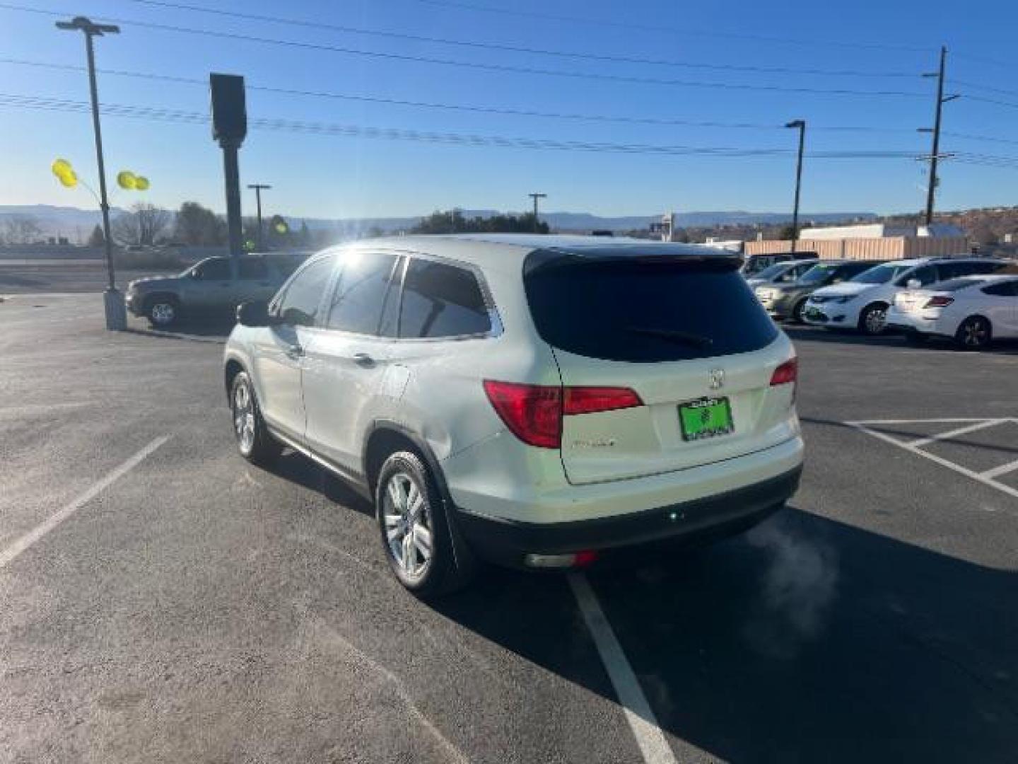 2017 White Diamond Pearl /Black Honda Pilot LX (5FNYF5H14HB) with an 3.5L V-6 gasoline direct injection engine, Automatic transmission, located at 1865 East Red Hills Pkwy, St. George, 84770, (435) 628-0023, 37.120850, -113.543640 - We specialize in helping ALL people get the best financing available. No matter your credit score, good, bad or none we can get you an amazing rate. Had a bankruptcy, divorce, or repossessions? We give you the green light to get your credit back on the road. Low down and affordable payments that fit - Photo#4