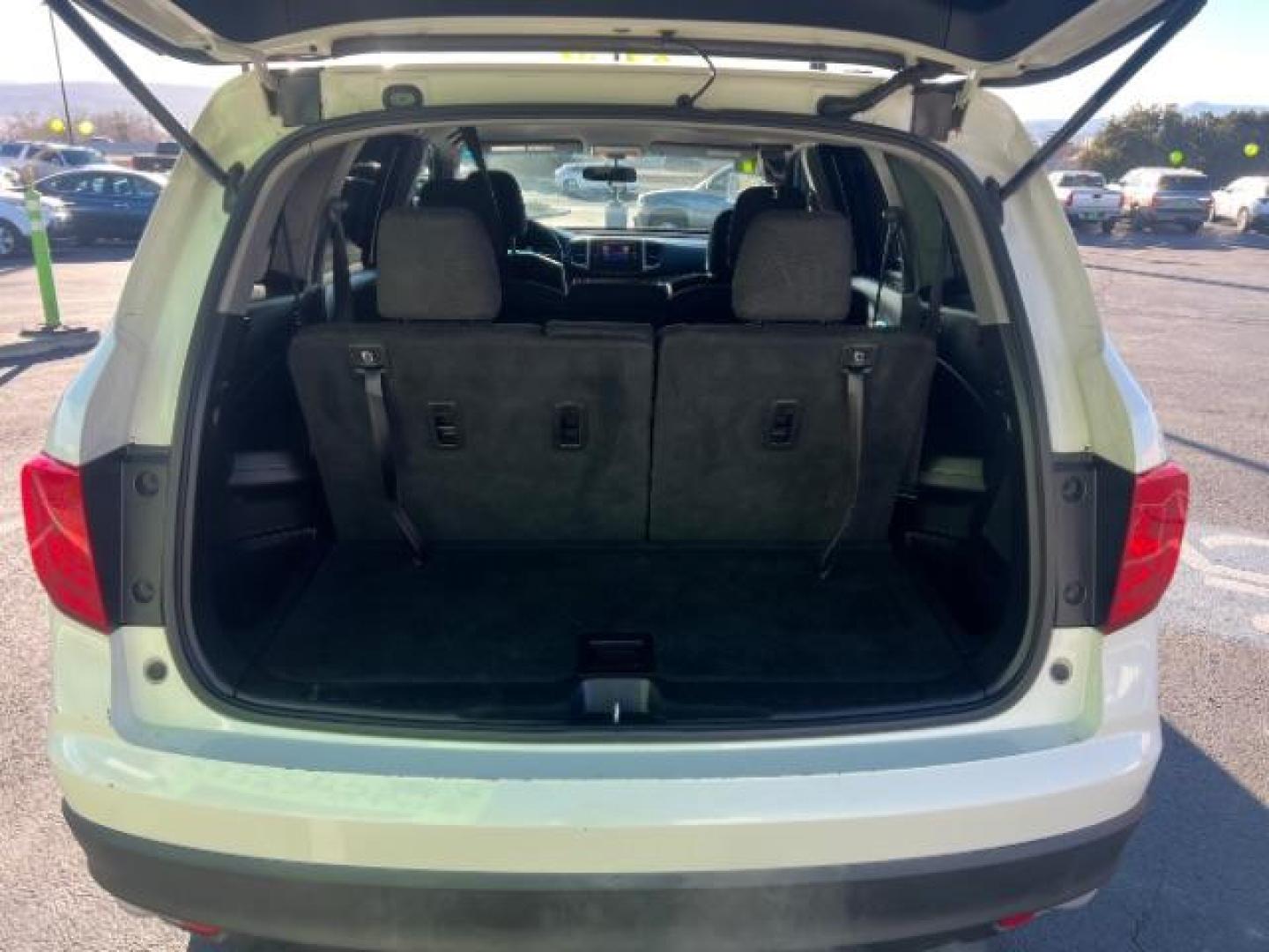 2017 White Diamond Pearl /Black Honda Pilot LX (5FNYF5H14HB) with an 3.5L V-6 gasoline direct injection engine, Automatic transmission, located at 1865 East Red Hills Pkwy, St. George, 84770, (435) 628-0023, 37.120850, -113.543640 - We specialize in helping ALL people get the best financing available. No matter your credit score, good, bad or none we can get you an amazing rate. Had a bankruptcy, divorce, or repossessions? We give you the green light to get your credit back on the road. Low down and affordable payments that fit - Photo#26