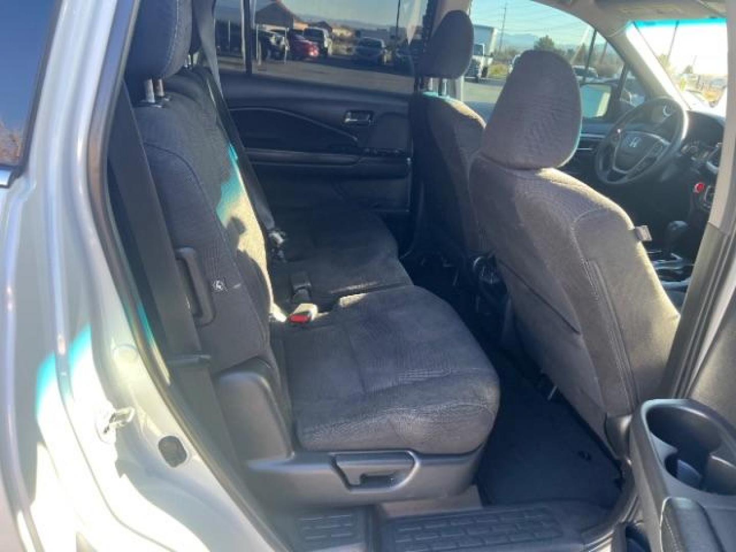 2017 White Diamond Pearl /Black Honda Pilot LX (5FNYF5H14HB) with an 3.5L V-6 gasoline direct injection engine, Automatic transmission, located at 1865 East Red Hills Pkwy, St. George, 84770, (435) 628-0023, 37.120850, -113.543640 - We specialize in helping ALL people get the best financing available. No matter your credit score, good, bad or none we can get you an amazing rate. Had a bankruptcy, divorce, or repossessions? We give you the green light to get your credit back on the road. Low down and affordable payments that fit - Photo#28