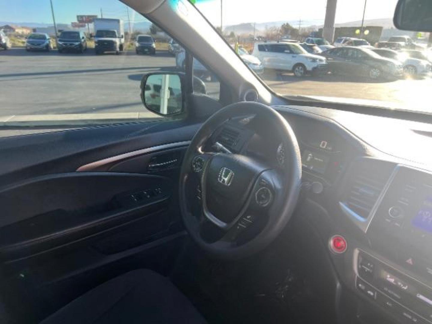 2017 White Diamond Pearl /Black Honda Pilot LX (5FNYF5H14HB) with an 3.5L V-6 gasoline direct injection engine, Automatic transmission, located at 1865 East Red Hills Pkwy, St. George, 84770, (435) 628-0023, 37.120850, -113.543640 - We specialize in helping ALL people get the best financing available. No matter your credit score, good, bad or none we can get you an amazing rate. Had a bankruptcy, divorce, or repossessions? We give you the green light to get your credit back on the road. Low down and affordable payments that fit - Photo#32