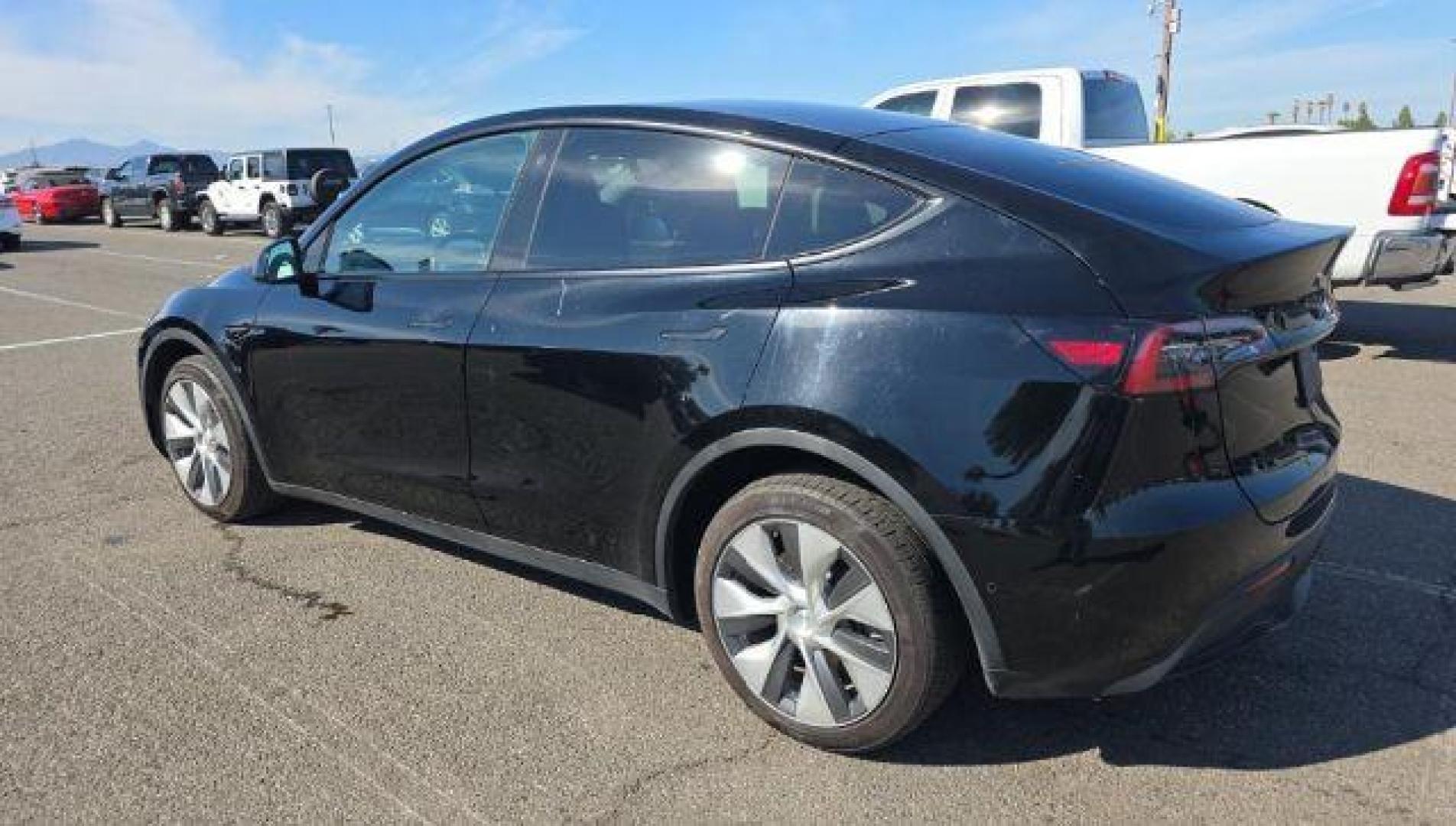 2022 Solid Black /Black Tesla Model Y Long Range Dual Motor All-Wheel Drive (7SAYGDEE9NF) , located at 1865 East Red Hills Pkwy, St. George, 84770, (435) 628-0023, 37.120850, -113.543640 - COMING SOON ****Price includes $4k IRS EV REBATE**** We are approved to file the EV rebate directly with the IRS. We recived the funds in 7 days and take credit off the price of car. Check with IRS EV website to be sure you qualify. This program ends Sept 30th so ACT FAST! This Tesla is an AWD Lo - Photo#1