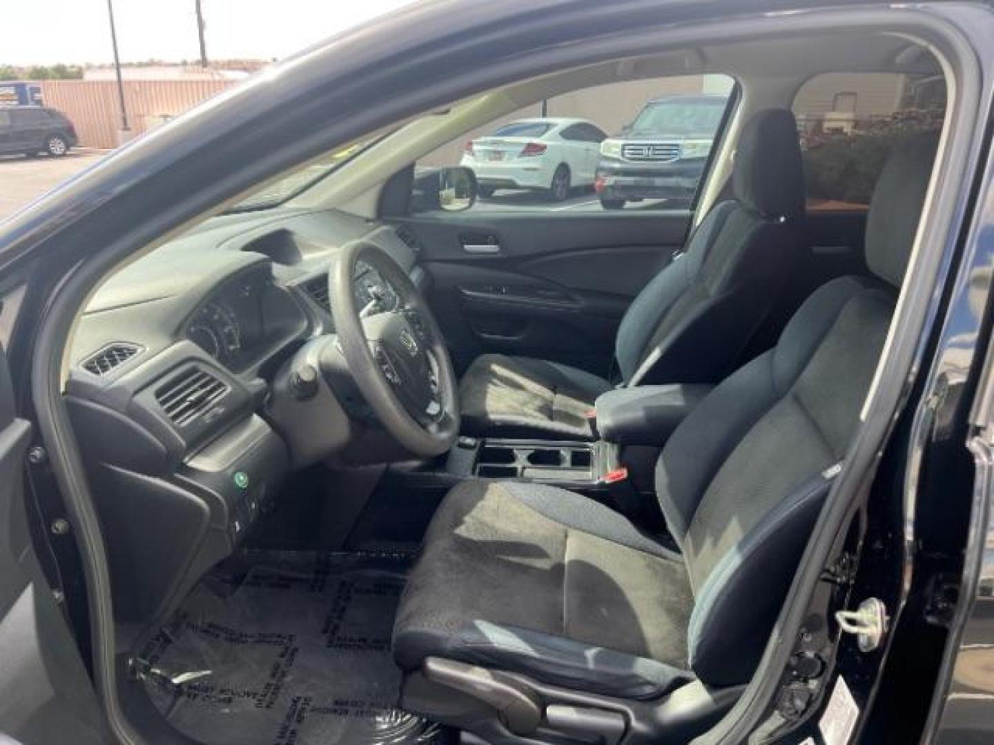 2016 Crystal Black Pearl /Gray Honda CR-V LX (2HKRM4H3XGH) with an 2.4L I-4 gasoline direct injection engine, Automatic transmission, located at 940 North Main Street, Cedar City, UT, 84720, (435) 628-0023, 37.692936, -113.061897 - We specialize in helping ALL people get the best financing available. No matter your credit score, good, bad or none we can get you an amazing rate. Had a bankruptcy, divorce, or repossessions? We give you the green light to get your credit back on the road. Low down and affordable payments that fit - Photo#14