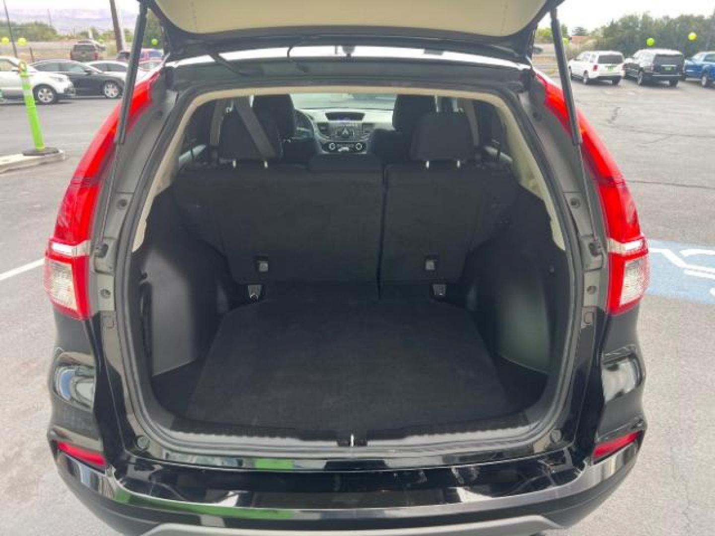 2016 Crystal Black Pearl /Gray Honda CR-V LX (2HKRM4H3XGH) with an 2.4L I-4 gasoline direct injection engine, Automatic transmission, located at 940 North Main Street, Cedar City, UT, 84720, (435) 628-0023, 37.692936, -113.061897 - We specialize in helping ALL people get the best financing available. No matter your credit score, good, bad or none we can get you an amazing rate. Had a bankruptcy, divorce, or repossessions? We give you the green light to get your credit back on the road. Low down and affordable payments that fit - Photo#24
