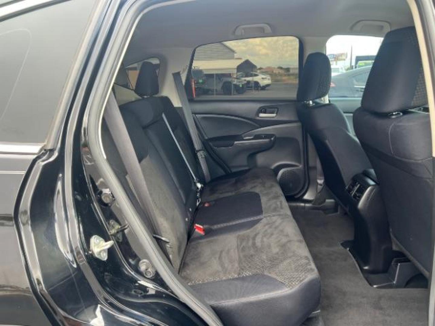 2016 Crystal Black Pearl /Gray Honda CR-V LX (2HKRM4H3XGH) with an 2.4L I-4 gasoline direct injection engine, Automatic transmission, located at 940 North Main Street, Cedar City, UT, 84720, (435) 628-0023, 37.692936, -113.061897 - We specialize in helping ALL people get the best financing available. No matter your credit score, good, bad or none we can get you an amazing rate. Had a bankruptcy, divorce, or repossessions? We give you the green light to get your credit back on the road. Low down and affordable payments that fit - Photo#26