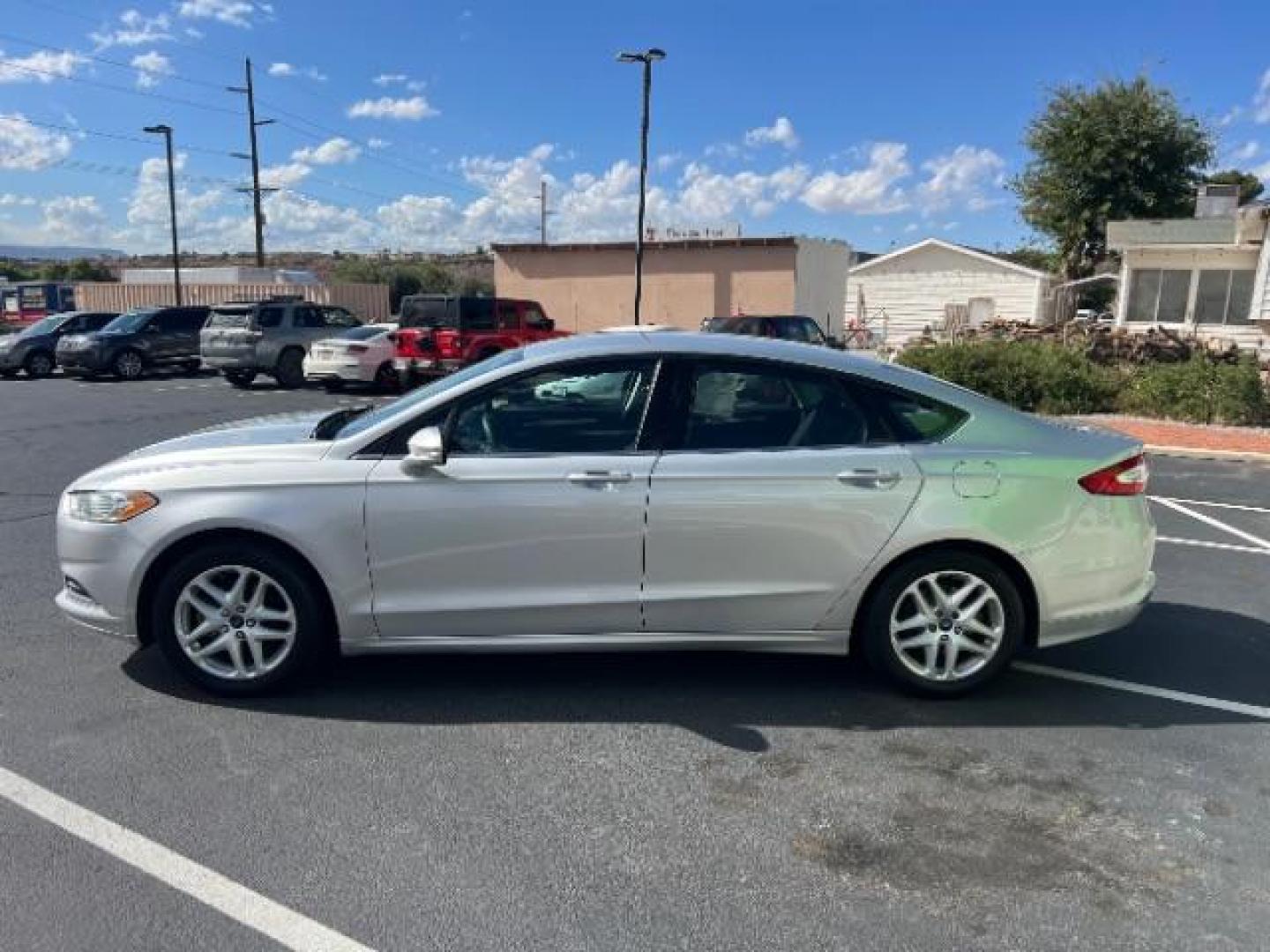 2016 Ingot Silver /Ebony Ford Fusion SE (3FA6P0H74GR) with an EcoBoost 1.5L I-4 gasoline direct injection engine, Automatic transmission, located at 1865 East Red Hills Pkwy, St. George, 84770, (435) 628-0023, 37.120850, -113.543640 - We specialize in helping ALL people get the best financing available. No matter your credit score, good, bad or none we can get you an amazing rate. Had a bankruptcy, divorce, or repossessions? We give you the green light to get your credit back on the road. Low down and affordable payments that fit - Photo#3