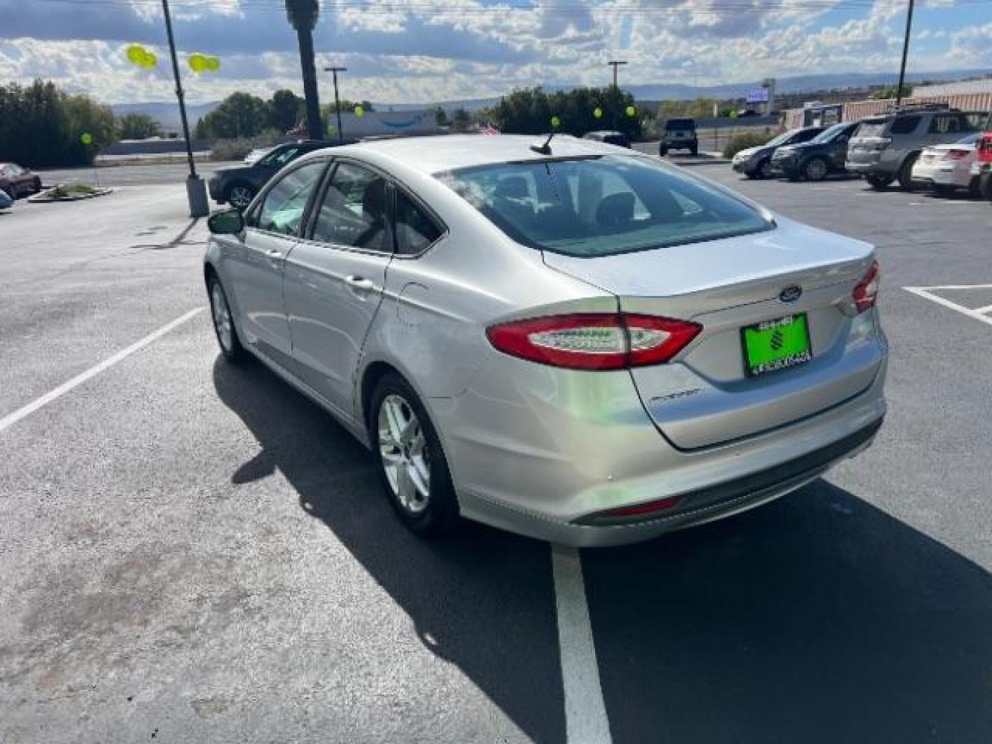 2016 Ingot Silver /Ebony Ford Fusion SE (3FA6P0H74GR) with an EcoBoost 1.5L I-4 gasoline direct injection engine, Automatic transmission, located at 1865 East Red Hills Pkwy, St. George, 84770, (435) 628-0023, 37.120850, -113.543640 - We specialize in helping ALL people get the best financing available. No matter your credit score, good, bad or none we can get you an amazing rate. Had a bankruptcy, divorce, or repossessions? We give you the green light to get your credit back on the road. Low down and affordable payments that fit - Photo#4