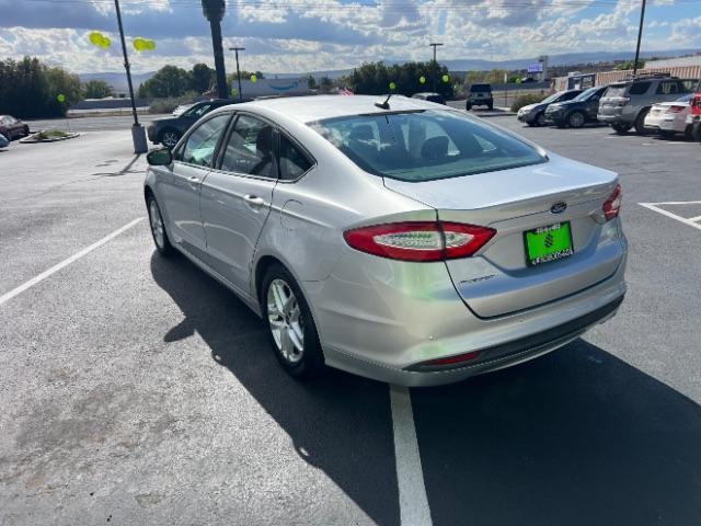 2016 Ingot Silver /Ebony Ford Fusion SE (3FA6P0H74GR) with an EcoBoost 1.5L I-4 ga engine, Automatic transmission, located at 1865 East Red Hills Pkwy, St. George, 84770, (435) 628-0023, 37.120850, -113.543640 - Photo#4