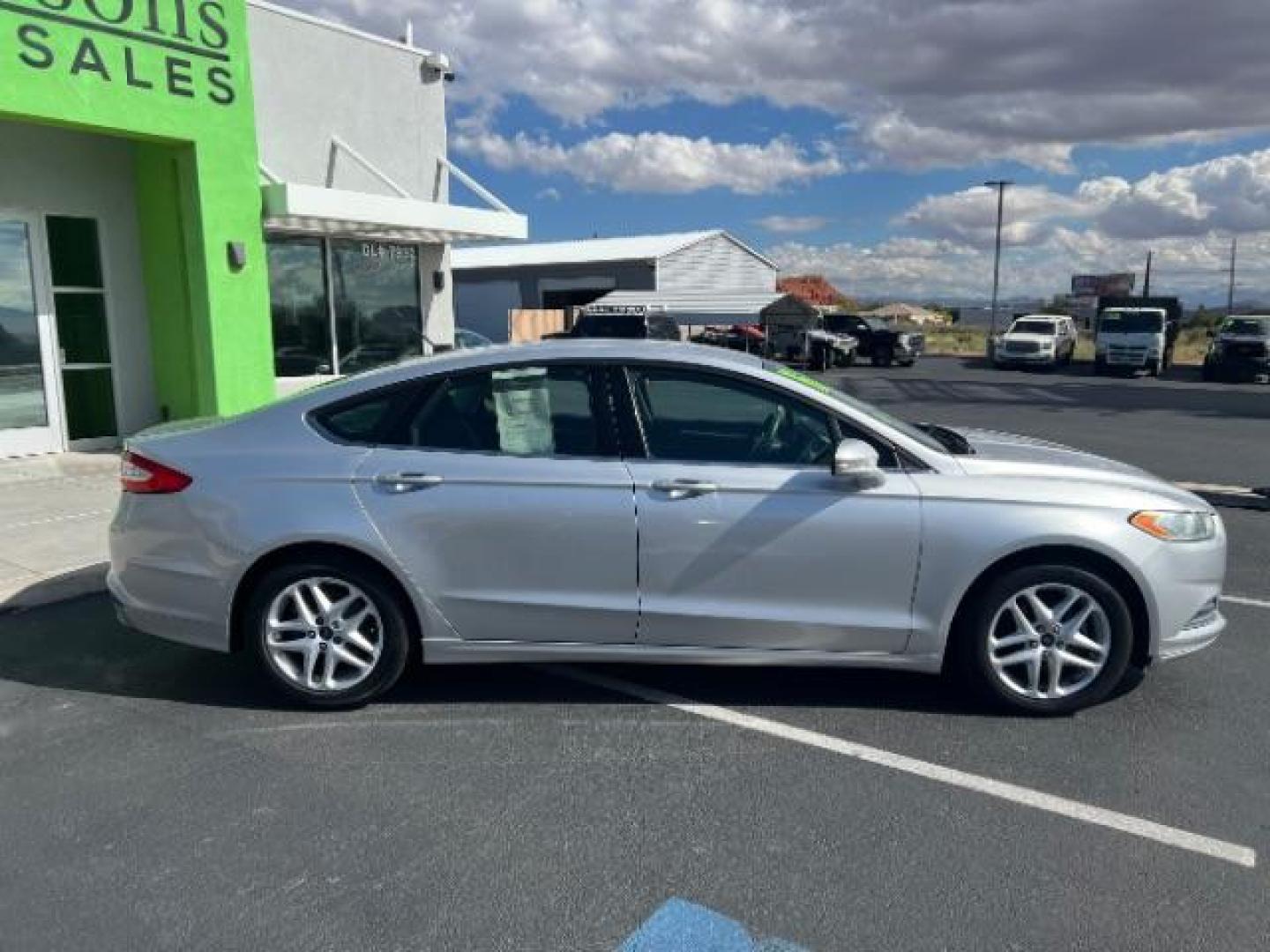 2016 Ingot Silver /Ebony Ford Fusion SE (3FA6P0H74GR) with an EcoBoost 1.5L I-4 gasoline direct injection engine, Automatic transmission, located at 1865 East Red Hills Pkwy, St. George, 84770, (435) 628-0023, 37.120850, -113.543640 - We specialize in helping ALL people get the best financing available. No matter your credit score, good, bad or none we can get you an amazing rate. Had a bankruptcy, divorce, or repossessions? We give you the green light to get your credit back on the road. Low down and affordable payments that fit - Photo#7