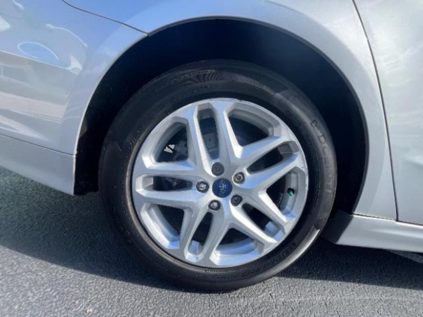 2016 Ingot Silver /Ebony Ford Fusion SE (3FA6P0H74GR) with an EcoBoost 1.5L I-4 gasoline direct injection engine, Automatic transmission, located at 1865 East Red Hills Pkwy, St. George, 84770, (435) 628-0023, 37.120850, -113.543640 - We specialize in helping ALL people get the best financing available. No matter your credit score, good, bad or none we can get you an amazing rate. Had a bankruptcy, divorce, or repossessions? We give you the green light to get your credit back on the road. Low down and affordable payments that fit - Photo#11