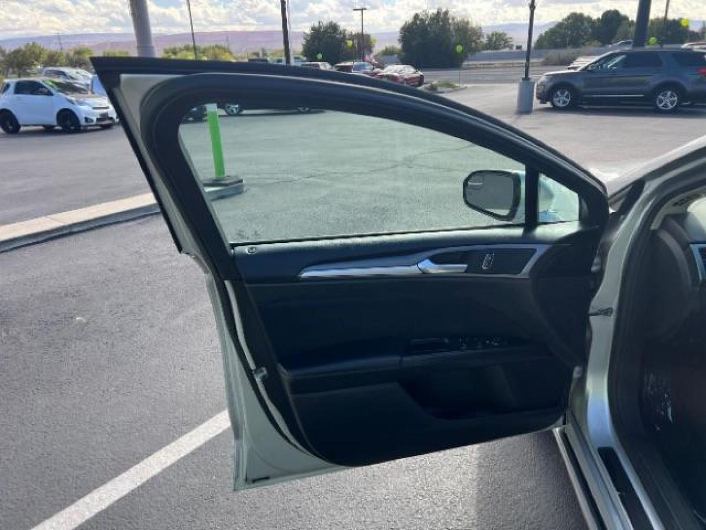 2016 Ingot Silver /Ebony Ford Fusion SE (3FA6P0H74GR) with an EcoBoost 1.5L I-4 gasoline direct injection engine, Automatic transmission, located at 1865 East Red Hills Pkwy, St. George, 84770, (435) 628-0023, 37.120850, -113.543640 - We specialize in helping ALL people get the best financing available. No matter your credit score, good, bad or none we can get you an amazing rate. Had a bankruptcy, divorce, or repossessions? We give you the green light to get your credit back on the road. Low down and affordable payments that fit - Photo#12