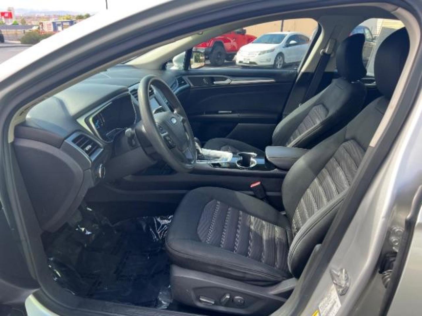 2016 Ingot Silver /Ebony Ford Fusion SE (3FA6P0H74GR) with an EcoBoost 1.5L I-4 gasoline direct injection engine, Automatic transmission, located at 1865 East Red Hills Pkwy, St. George, 84770, (435) 628-0023, 37.120850, -113.543640 - We specialize in helping ALL people get the best financing available. No matter your credit score, good, bad or none we can get you an amazing rate. Had a bankruptcy, divorce, or repossessions? We give you the green light to get your credit back on the road. Low down and affordable payments that fit - Photo#14