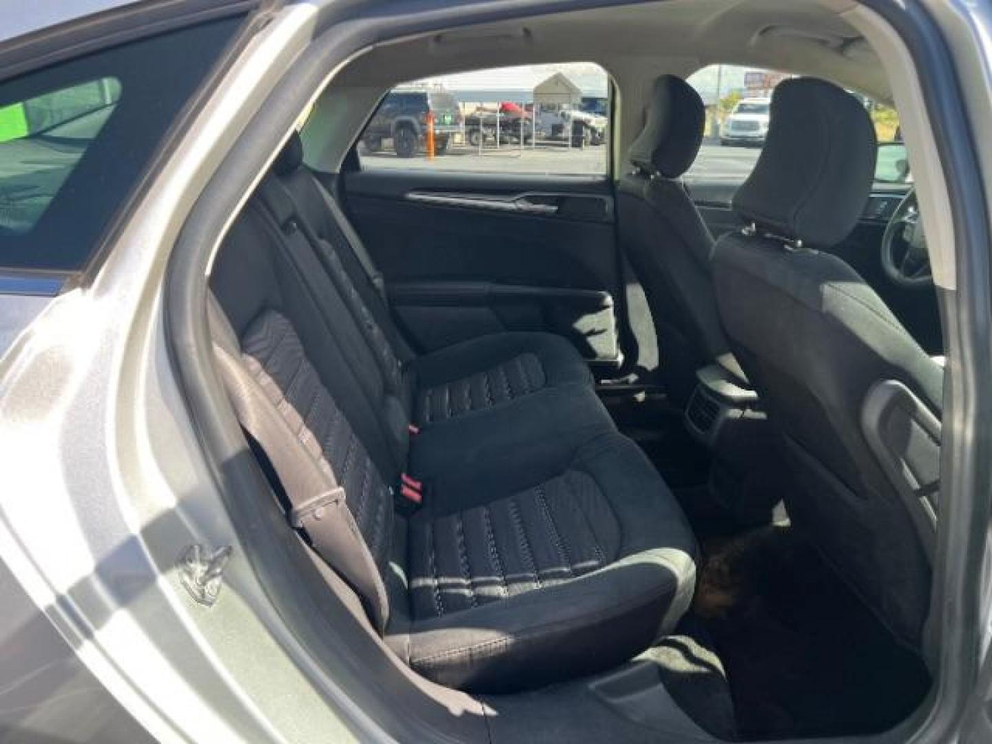 2016 Ingot Silver /Ebony Ford Fusion SE (3FA6P0H74GR) with an EcoBoost 1.5L I-4 gasoline direct injection engine, Automatic transmission, located at 1865 East Red Hills Pkwy, St. George, 84770, (435) 628-0023, 37.120850, -113.543640 - We specialize in helping ALL people get the best financing available. No matter your credit score, good, bad or none we can get you an amazing rate. Had a bankruptcy, divorce, or repossessions? We give you the green light to get your credit back on the road. Low down and affordable payments that fit - Photo#26