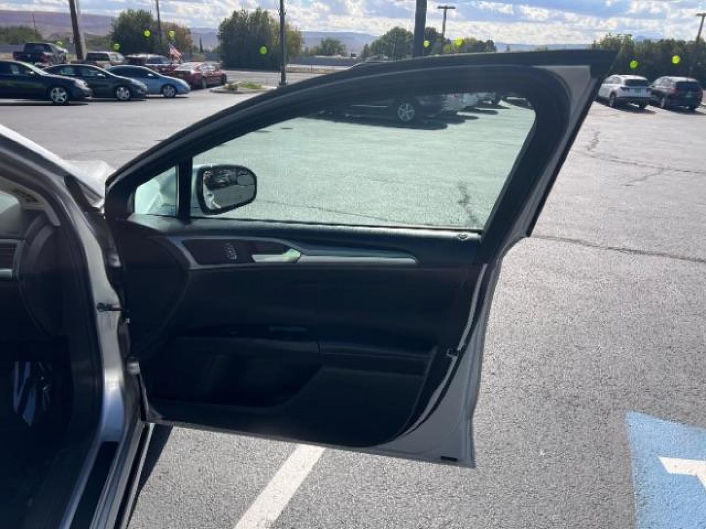 2016 Ingot Silver /Ebony Ford Fusion SE (3FA6P0H74GR) with an EcoBoost 1.5L I-4 gasoline direct injection engine, Automatic transmission, located at 1865 East Red Hills Pkwy, St. George, 84770, (435) 628-0023, 37.120850, -113.543640 - We specialize in helping ALL people get the best financing available. No matter your credit score, good, bad or none we can get you an amazing rate. Had a bankruptcy, divorce, or repossessions? We give you the green light to get your credit back on the road. Low down and affordable payments that fit - Photo#27