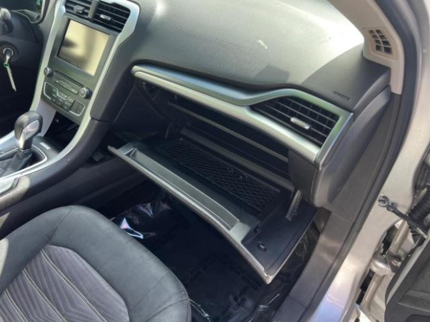 2016 Ingot Silver /Ebony Ford Fusion SE (3FA6P0H74GR) with an EcoBoost 1.5L I-4 gasoline direct injection engine, Automatic transmission, located at 1865 East Red Hills Pkwy, St. George, 84770, (435) 628-0023, 37.120850, -113.543640 - We specialize in helping ALL people get the best financing available. No matter your credit score, good, bad or none we can get you an amazing rate. Had a bankruptcy, divorce, or repossessions? We give you the green light to get your credit back on the road. Low down and affordable payments that fit - Photo#29