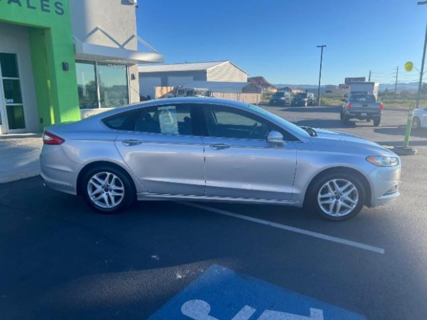 2016 Ingot Silver /Ebony Ford Fusion SE (3FA6P0H74GR) with an EcoBoost 1.5L I-4 gasoline direct injection engine, Automatic transmission, located at 1865 East Red Hills Pkwy, St. George, 84770, (435) 628-0023, 37.120850, -113.543640 - We specialize in helping ALL people get the best financing available. No matter your credit score, good, bad or none we can get you an amazing rate. Had a bankruptcy, divorce, or repossessions? We give you the green light to get your credit back on the road. Low down and affordable payments that fit - Photo#7