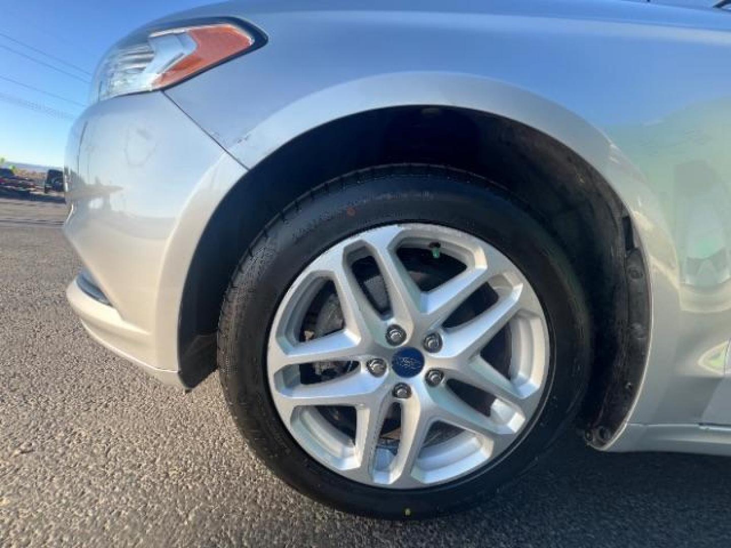 2016 Ingot Silver /Ebony Ford Fusion SE (3FA6P0H74GR) with an EcoBoost 1.5L I-4 gasoline direct injection engine, Automatic transmission, located at 1865 East Red Hills Pkwy, St. George, 84770, (435) 628-0023, 37.120850, -113.543640 - We specialize in helping ALL people get the best financing available. No matter your credit score, good, bad or none we can get you an amazing rate. Had a bankruptcy, divorce, or repossessions? We give you the green light to get your credit back on the road. Low down and affordable payments that fit - Photo#11