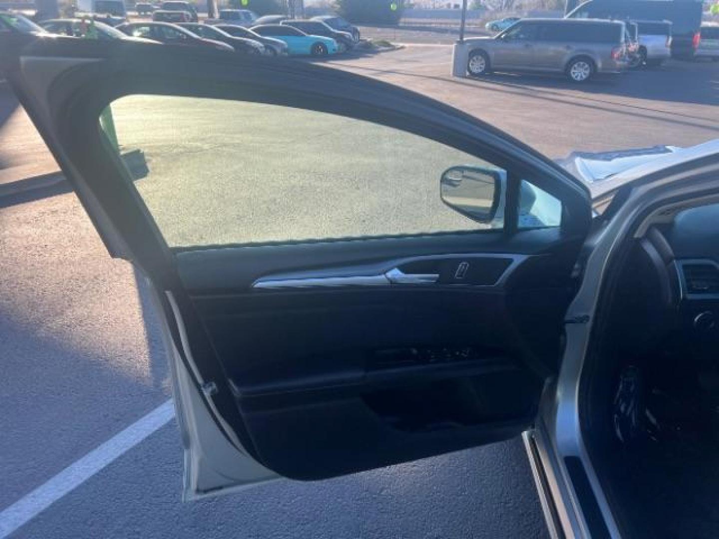 2016 Ingot Silver /Ebony Ford Fusion SE (3FA6P0H74GR) with an EcoBoost 1.5L I-4 gasoline direct injection engine, Automatic transmission, located at 1865 East Red Hills Pkwy, St. George, 84770, (435) 628-0023, 37.120850, -113.543640 - We specialize in helping ALL people get the best financing available. No matter your credit score, good, bad or none we can get you an amazing rate. Had a bankruptcy, divorce, or repossessions? We give you the green light to get your credit back on the road. Low down and affordable payments that fit - Photo#12