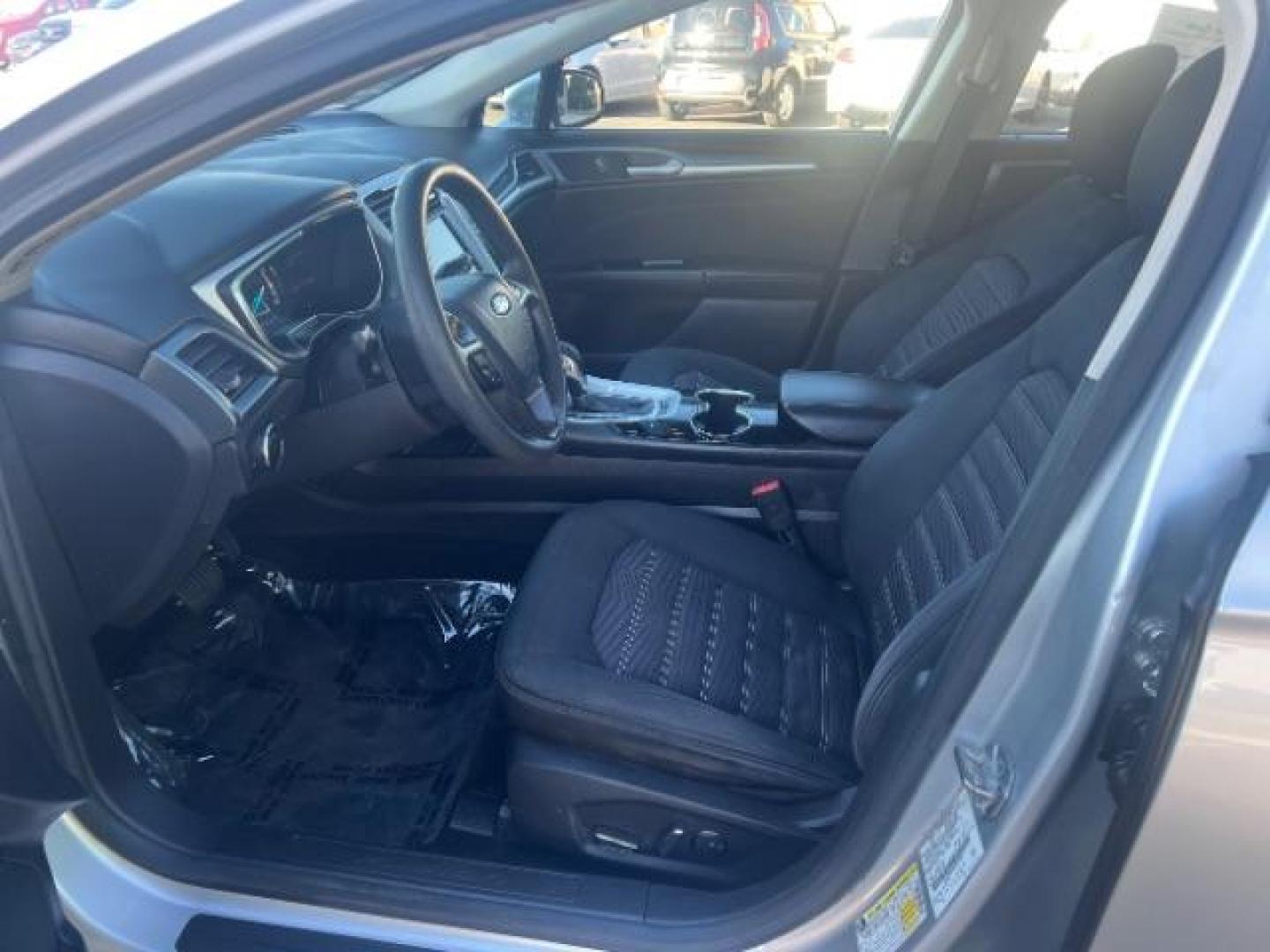 2016 Ingot Silver /Ebony Ford Fusion SE (3FA6P0H74GR) with an EcoBoost 1.5L I-4 gasoline direct injection engine, Automatic transmission, located at 1865 East Red Hills Pkwy, St. George, 84770, (435) 628-0023, 37.120850, -113.543640 - We specialize in helping ALL people get the best financing available. No matter your credit score, good, bad or none we can get you an amazing rate. Had a bankruptcy, divorce, or repossessions? We give you the green light to get your credit back on the road. Low down and affordable payments that fit - Photo#14