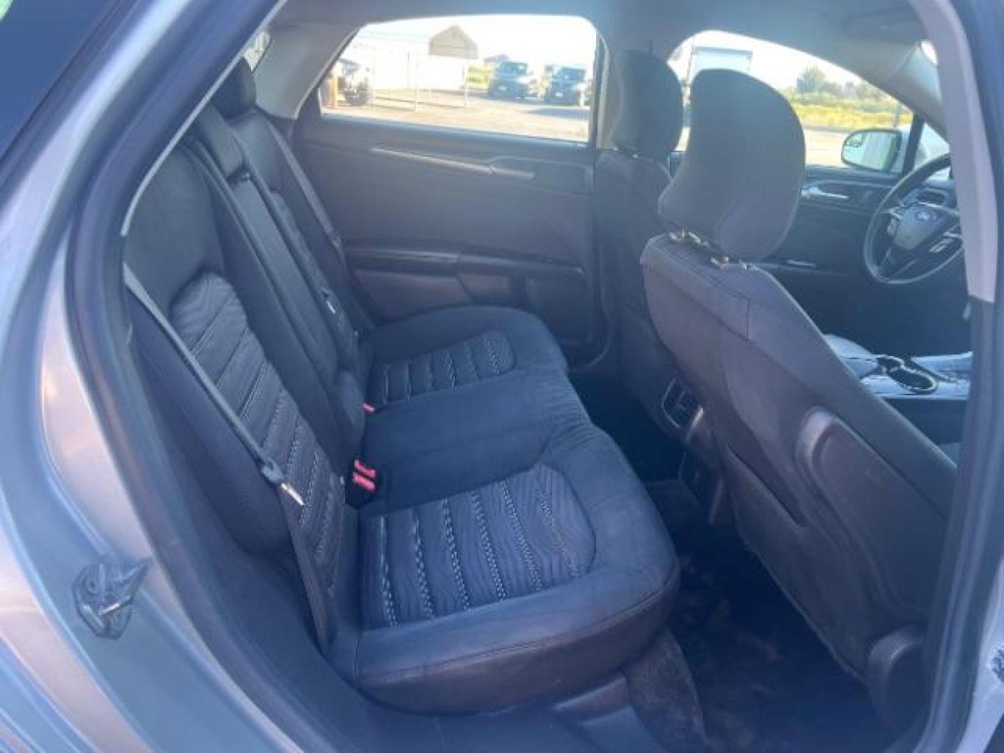 2016 Ingot Silver /Ebony Ford Fusion SE (3FA6P0H74GR) with an EcoBoost 1.5L I-4 gasoline direct injection engine, Automatic transmission, located at 1865 East Red Hills Pkwy, St. George, 84770, (435) 628-0023, 37.120850, -113.543640 - We specialize in helping ALL people get the best financing available. No matter your credit score, good, bad or none we can get you an amazing rate. Had a bankruptcy, divorce, or repossessions? We give you the green light to get your credit back on the road. Low down and affordable payments that fit - Photo#26