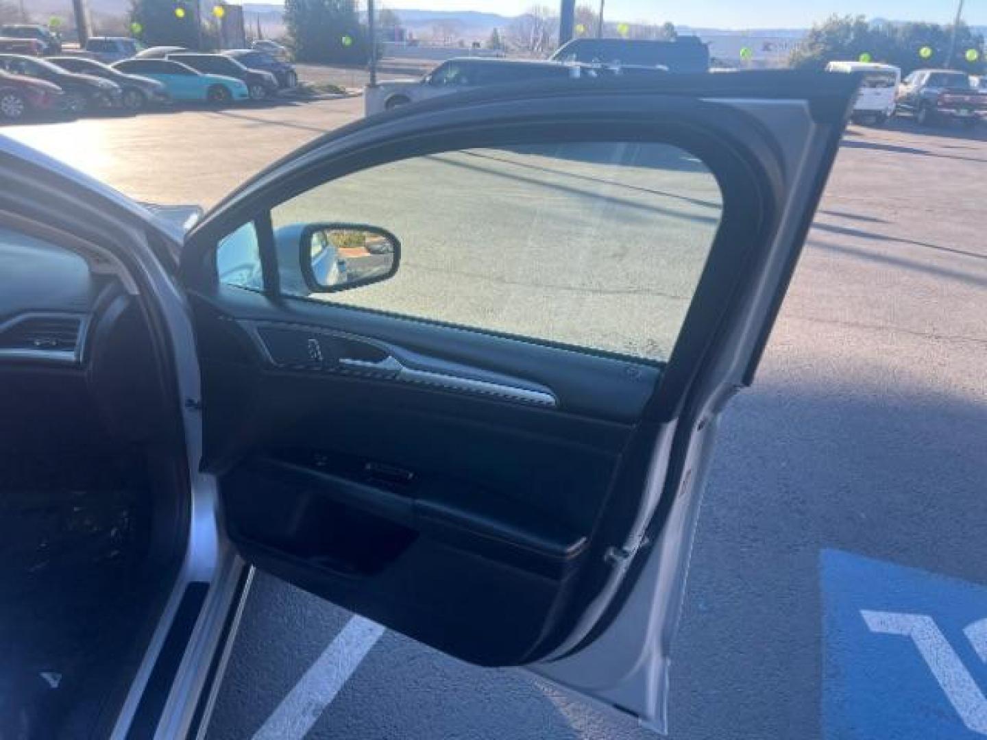 2016 Ingot Silver /Ebony Ford Fusion SE (3FA6P0H74GR) with an EcoBoost 1.5L I-4 gasoline direct injection engine, Automatic transmission, located at 1865 East Red Hills Pkwy, St. George, 84770, (435) 628-0023, 37.120850, -113.543640 - We specialize in helping ALL people get the best financing available. No matter your credit score, good, bad or none we can get you an amazing rate. Had a bankruptcy, divorce, or repossessions? We give you the green light to get your credit back on the road. Low down and affordable payments that fit - Photo#27