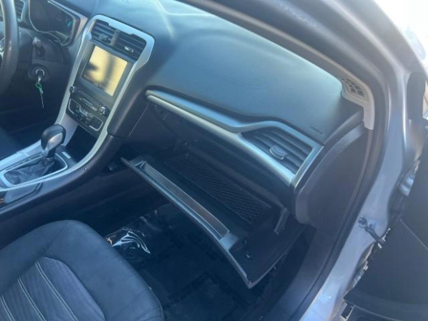 2016 Ingot Silver /Ebony Ford Fusion SE (3FA6P0H74GR) with an EcoBoost 1.5L I-4 gasoline direct injection engine, Automatic transmission, located at 1865 East Red Hills Pkwy, St. George, 84770, (435) 628-0023, 37.120850, -113.543640 - We specialize in helping ALL people get the best financing available. No matter your credit score, good, bad or none we can get you an amazing rate. Had a bankruptcy, divorce, or repossessions? We give you the green light to get your credit back on the road. Low down and affordable payments that fit - Photo#29