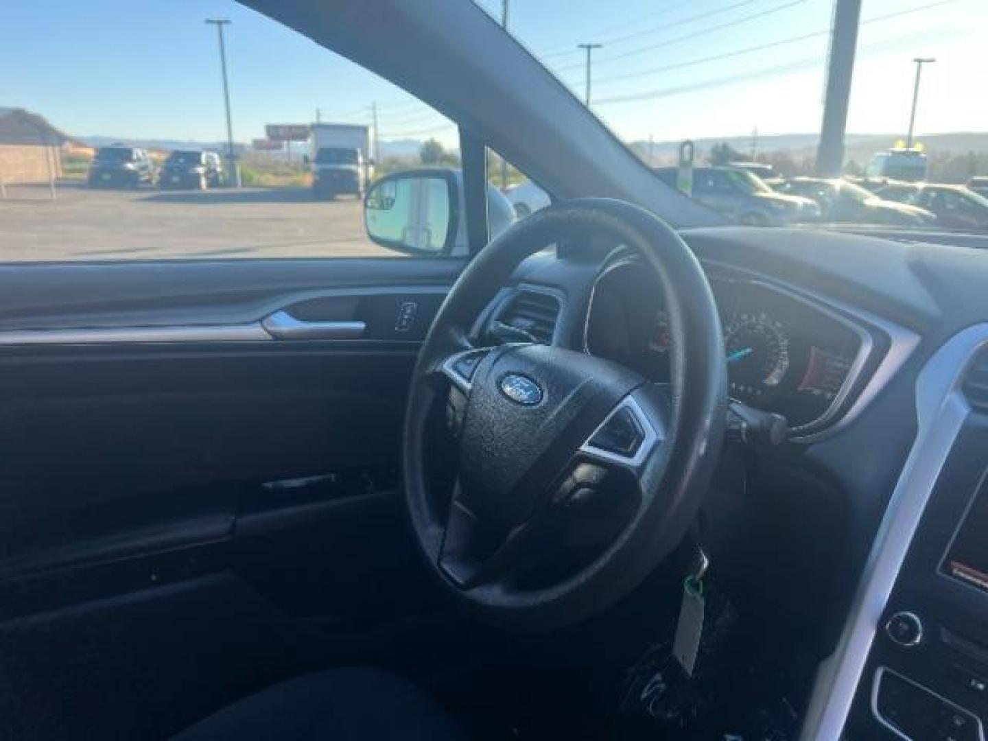 2016 Ingot Silver /Ebony Ford Fusion SE (3FA6P0H74GR) with an EcoBoost 1.5L I-4 gasoline direct injection engine, Automatic transmission, located at 1865 East Red Hills Pkwy, St. George, 84770, (435) 628-0023, 37.120850, -113.543640 - We specialize in helping ALL people get the best financing available. No matter your credit score, good, bad or none we can get you an amazing rate. Had a bankruptcy, divorce, or repossessions? We give you the green light to get your credit back on the road. Low down and affordable payments that fit - Photo#30
