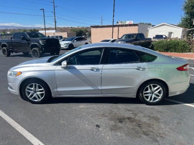 2016 Ingot Silver /Ebony Ford Fusion SE (3FA6P0H74GR) with an EcoBoost 1.5L I-4 gasoline direct injection engine, Automatic transmission, located at 1865 East Red Hills Pkwy, St. George, 84770, (435) 628-0023, 37.120850, -113.543640 - Cash Deal / As-Is: Versatile Southern Utah travel starts with this 2016 Ford Fusion SE. Its 2.5L 4-cylinder engine, automatic transmission, and front-wheel drive make it a smart fit for commuting, errands, and Southern Utah road trips. With 129,280 miles, this Fusion is ready for its next adventure.- Photo#3