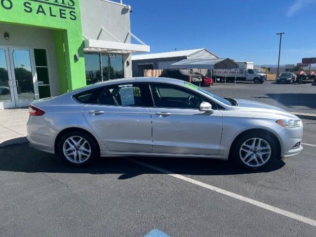 2016 Ingot Silver /Ebony Ford Fusion SE (3FA6P0H74GR) with an EcoBoost 1.5L I-4 gasoline direct injection engine, Automatic transmission, located at 1865 East Red Hills Pkwy, St. George, 84770, (435) 628-0023, 37.120850, -113.543640 - Cash Deal / As-Is: Versatile Southern Utah travel starts with this 2016 Ford Fusion SE. Its 2.5L 4-cylinder engine, automatic transmission, and front-wheel drive make it a smart fit for commuting, errands, and Southern Utah road trips. With 129,280 miles, this Fusion is ready for its next adventure.- Photo#7