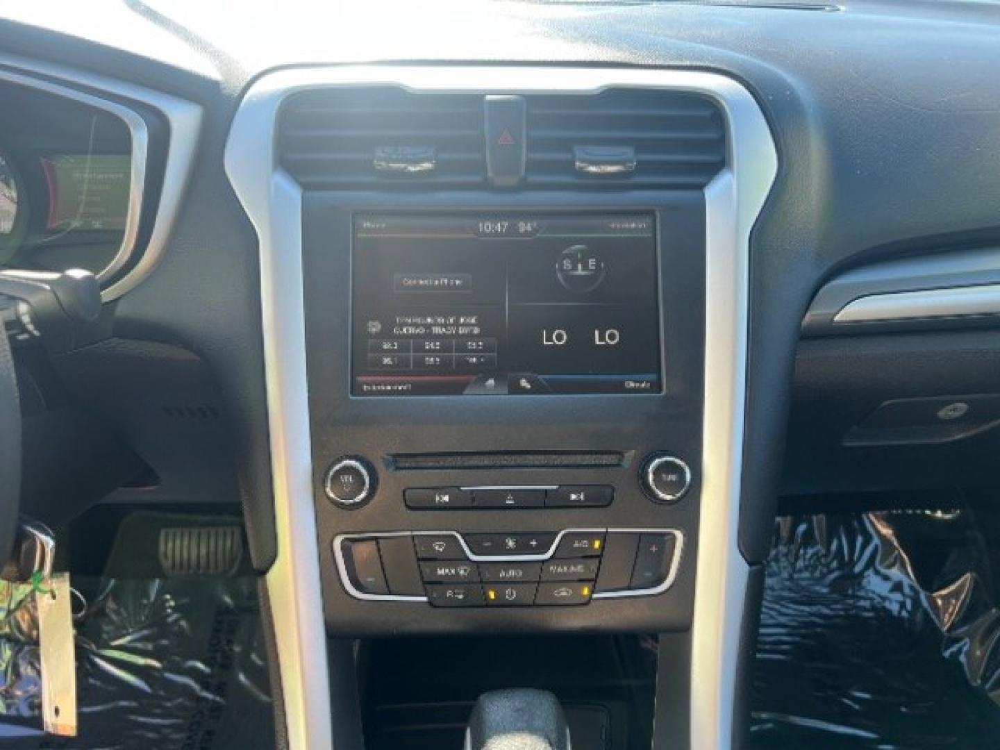 2016 Ingot Silver /Ebony Ford Fusion SE (3FA6P0H74GR) with an EcoBoost 1.5L I-4 gasoline direct injection engine, Automatic transmission, located at 940 North Main Street, Cedar City, UT, 84720, (435) 628-0023, 37.692936, -113.061897 - Cash Deal / As-Is: Versatile Southern Utah travel starts with this 2016 Ford Fusion SE. Its 2.5L 4-cylinder engine, automatic transmission, and front-wheel drive make it a smart fit for commuting, errands, and Southern Utah road trips. With 129,280 miles, this Fusion is ready for its next adventure.- Photo#17