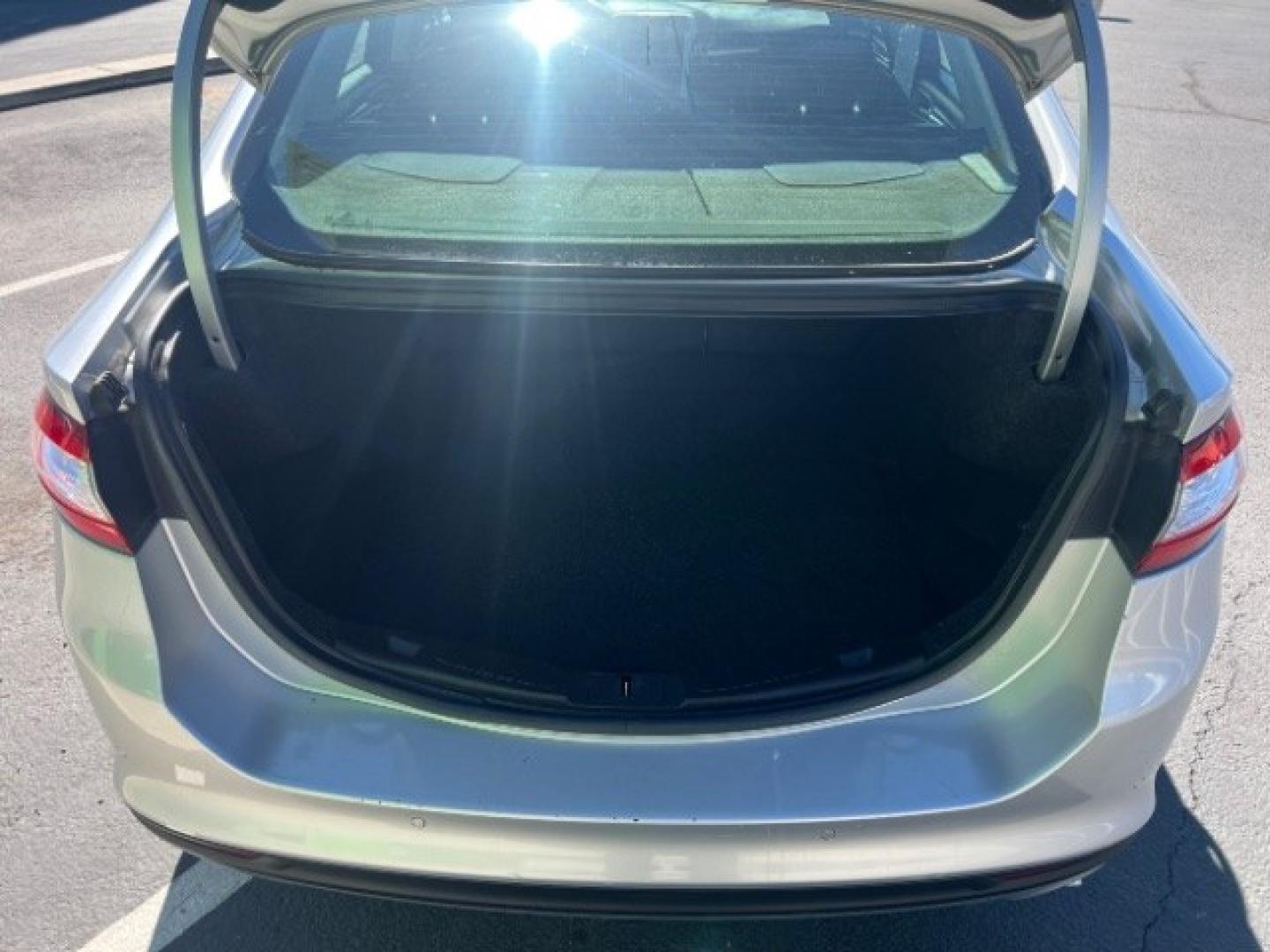 2016 Ingot Silver /Ebony Ford Fusion SE (3FA6P0H74GR) with an EcoBoost 1.5L I-4 gasoline direct injection engine, Automatic transmission, located at 940 North Main Street, Cedar City, UT, 84720, (435) 628-0023, 37.692936, -113.061897 - Cash Deal / As-Is: Versatile Southern Utah travel starts with this 2016 Ford Fusion SE. Its 2.5L 4-cylinder engine, automatic transmission, and front-wheel drive make it a smart fit for commuting, errands, and Southern Utah road trips. With 129,280 miles, this Fusion is ready for its next adventure.- Photo#24