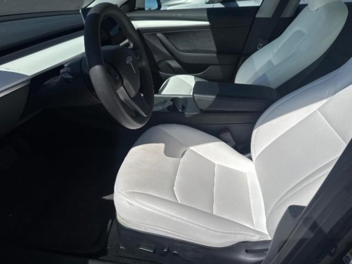 2023 Solid Black /white leather Tesla Model 3 Rear-Wheel Drive (5YJ3E1EAXPF) with an ELECTRIC engine, Electric transmission, located at 1865 East Red Hills Pkwy, St. George, 84770, (435) 628-0023, 37.120850, -113.543640 - We specialize in helping ALL people get the best financing available. No matter your credit score, good, bad or none we can get you an amazing rate. Had a bankruptcy, divorce, or repossessions? We give you the green light to get your credit back on the road. Low down and affordable payments that fit - Photo#2