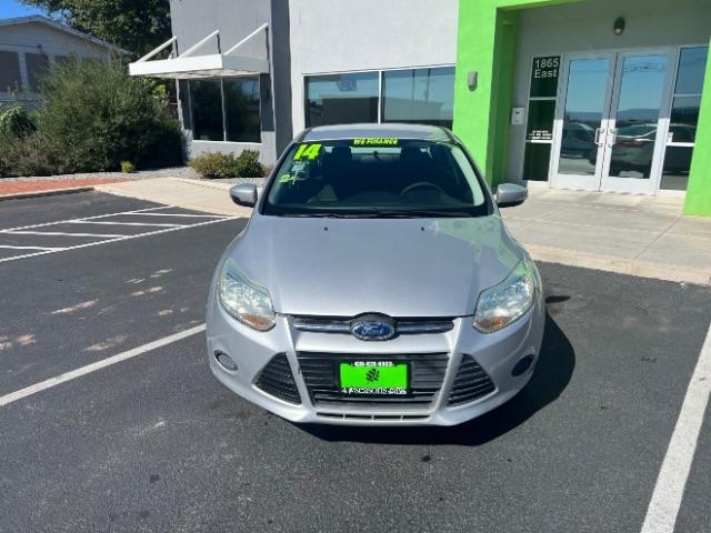 2014 Ingot Silver Metalli /Charcoal Black Ford Focus SE Sedan (1FADP3F21EL) with an 2.0L L4 DOHC 16V engine, 6-Speed Automatic transmission, located at 1865 East Red Hills Pkwy, St. George, 84770, (435) 628-0023, 37.120850, -113.543640- Photo#1