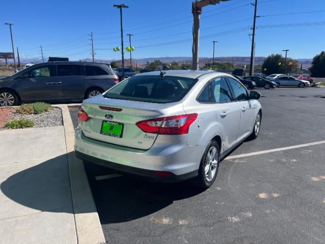 2014 Ingot Silver Metalli /Charcoal Black Ford Focus SE Sedan (1FADP3F21EL) with an 2.0L L4 DOHC 16V engine, 6-Speed Automatic transmission, located at 1865 East Red Hills Pkwy, St. George, 84770, (435) 628-0023, 37.120850, -113.543640- Photo#6