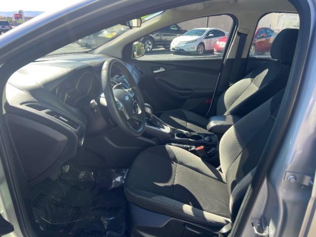 2014 Ingot Silver Metalli /Charcoal Black Ford Focus SE Sedan (1FADP3F21EL) with an 2.0L L4 DOHC 16V engine, 6-Speed Automatic transmission, located at 1865 East Red Hills Pkwy, St. George, 84770, (435) 628-0023, 37.120850, -113.543640- Photo#14