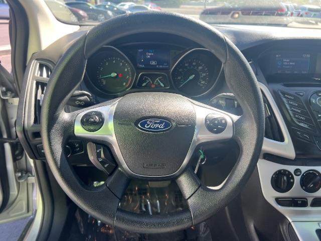 2014 Ingot Silver Metalli /Charcoal Black Ford Focus SE Sedan (1FADP3F21EL) with an 2.0L L4 DOHC 16V engine, 6-Speed Automatic transmission, located at 1865 East Red Hills Pkwy, St. George, 84770, (435) 628-0023, 37.120850, -113.543640- Photo#15