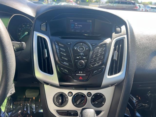 2014 Ingot Silver Metalli /Charcoal Black Ford Focus SE Sedan (1FADP3F21EL) with an 2.0L L4 DOHC 16V engine, 6-Speed Automatic transmission, located at 1865 East Red Hills Pkwy, St. George, 84770, (435) 628-0023, 37.120850, -113.543640- Photo#17