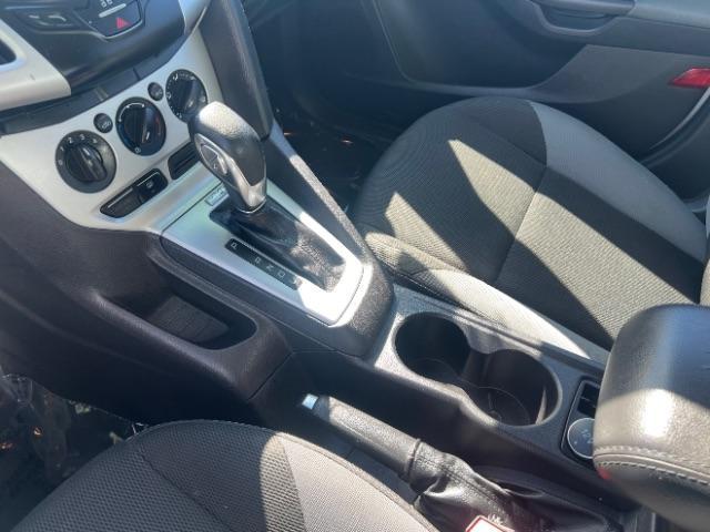 2014 Ingot Silver Metalli /Charcoal Black Ford Focus SE Sedan (1FADP3F21EL) with an 2.0L L4 DOHC 16V engine, 6-Speed Automatic transmission, located at 1865 East Red Hills Pkwy, St. George, 84770, (435) 628-0023, 37.120850, -113.543640- Photo#18