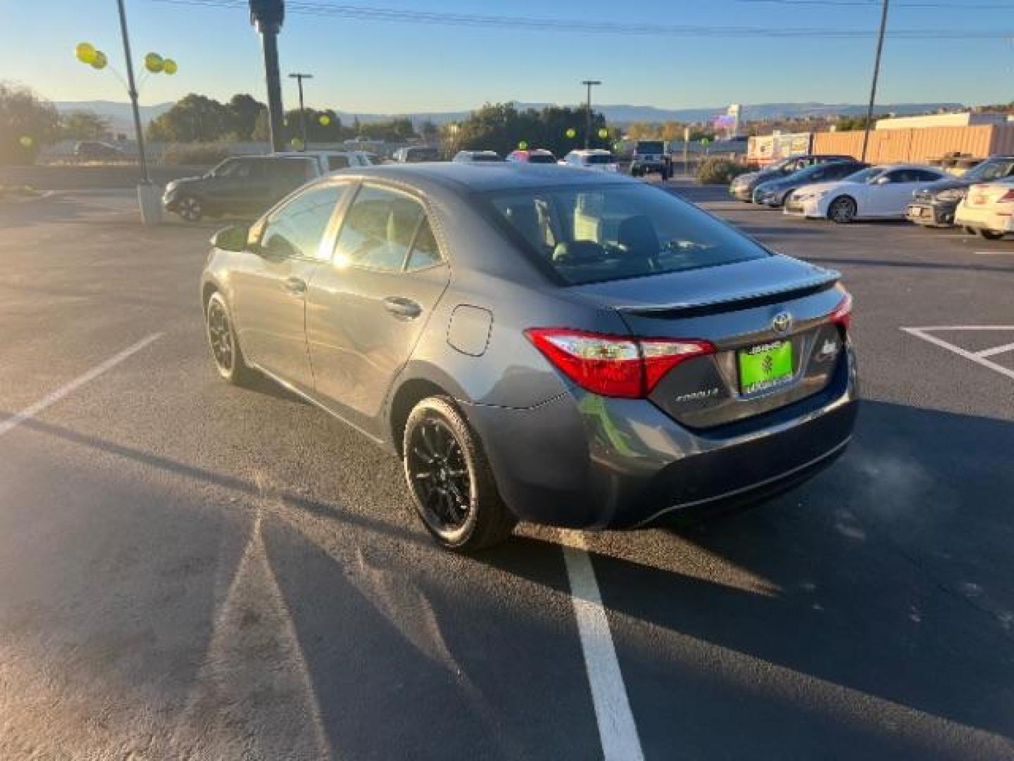 2015 Slate Metallic /Steel Gray Toyota Corolla L | LE | S | S Plus | LE Plus | LE Premium | S Premium (5YFBURHE3FP) with an 1.8L I-4 DOHC engine, Automatic transmission, located at 940 North Main Street, Cedar City, UT, 84720, (435) 628-0023, 37.692936, -113.061897 - We specialize in helping ALL people get the best financing available. No matter your credit score, good, bad or none we can get you an amazing rate. Had a bankruptcy, divorce, or repossessions? We give you the green light to get your credit back on the road. Low down and affordable payments that fit - Photo#4