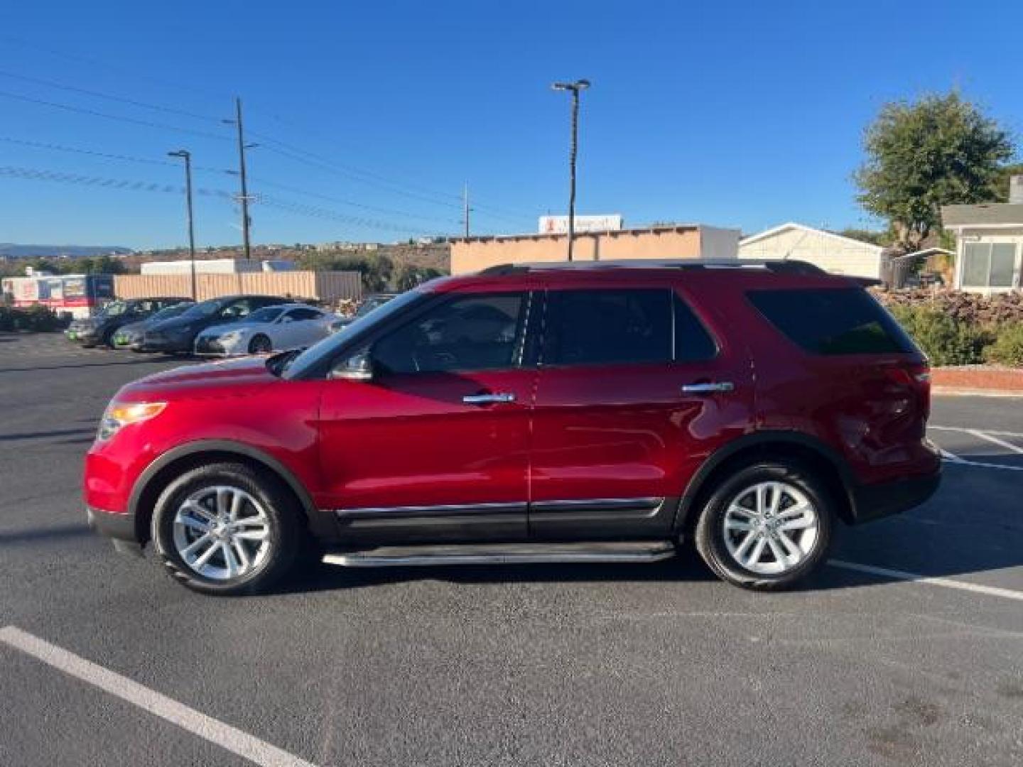 2015 Ruby Red Metallic Tinted Clearcoat /Medium Light Stone Ford Explorer XLT (1FM5K7D81FG) with an EcoBoost 2L I-4 gasoline direct injection engine, Automatic transmission, located at 1865 East Red Hills Pkwy, St. George, 84770, (435) 628-0023, 37.120850, -113.543640 - We specialize in helping ALL people get the best financing available. No matter your credit score, good, bad or none we can get you an amazing rate. Had a bankruptcy, divorce, or repossessions? We give you the green light to get your credit back on the road. Low down and affordable payments that fit - Photo#3