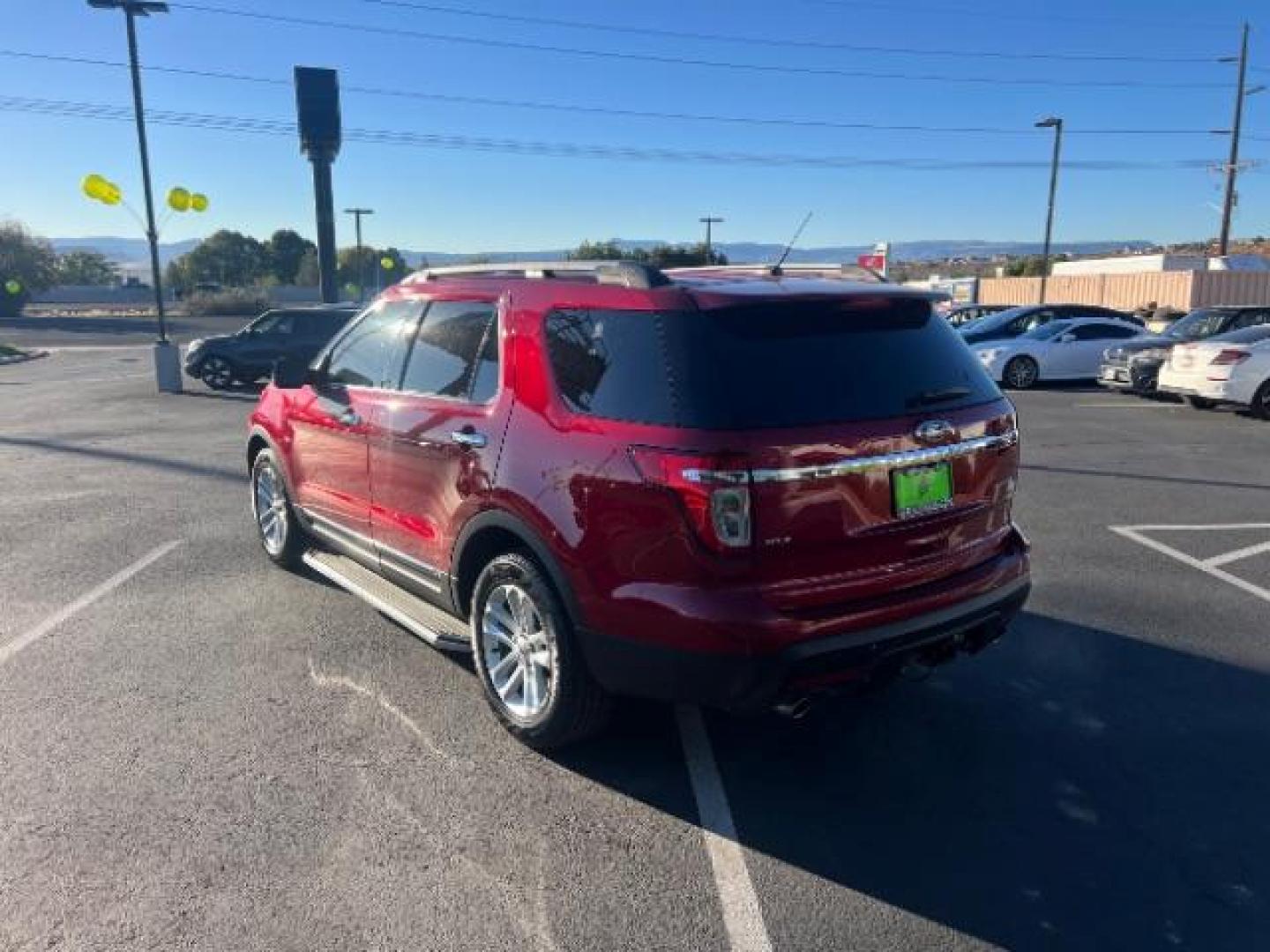 2015 Ruby Red Metallic Tinted Clearcoat /Medium Light Stone Ford Explorer XLT (1FM5K7D81FG) with an EcoBoost 2L I-4 gasoline direct injection engine, Automatic transmission, located at 1865 East Red Hills Pkwy, St. George, 84770, (435) 628-0023, 37.120850, -113.543640 - We specialize in helping ALL people get the best financing available. No matter your credit score, good, bad or none we can get you an amazing rate. Had a bankruptcy, divorce, or repossessions? We give you the green light to get your credit back on the road. Low down and affordable payments that fit - Photo#4