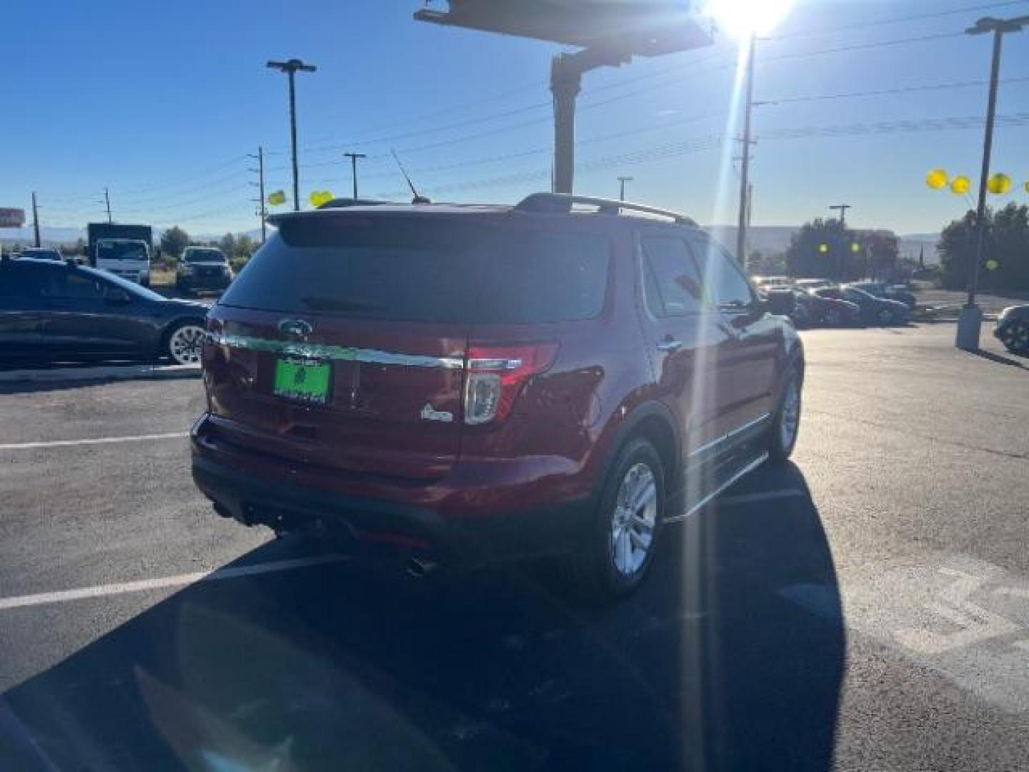 2015 Ruby Red Metallic Tinted Clearcoat /Medium Light Stone Ford Explorer XLT (1FM5K7D81FG) with an EcoBoost 2L I-4 gasoline direct injection engine, Automatic transmission, located at 1865 East Red Hills Pkwy, St. George, 84770, (435) 628-0023, 37.120850, -113.543640 - We specialize in helping ALL people get the best financing available. No matter your credit score, good, bad or none we can get you an amazing rate. Had a bankruptcy, divorce, or repossessions? We give you the green light to get your credit back on the road. Low down and affordable payments that fit - Photo#6