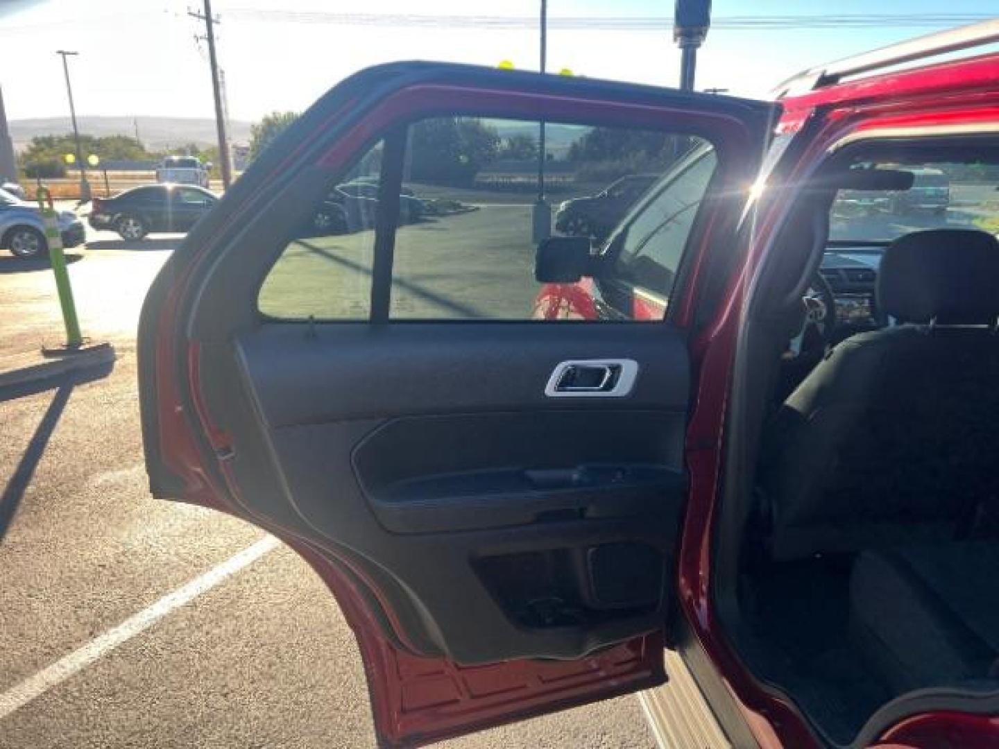 2015 Ruby Red Metallic Tinted Clearcoat /Medium Light Stone Ford Explorer XLT (1FM5K7D81FG) with an EcoBoost 2L I-4 gasoline direct injection engine, Automatic transmission, located at 1865 East Red Hills Pkwy, St. George, 84770, (435) 628-0023, 37.120850, -113.543640 - We specialize in helping ALL people get the best financing available. No matter your credit score, good, bad or none we can get you an amazing rate. Had a bankruptcy, divorce, or repossessions? We give you the green light to get your credit back on the road. Low down and affordable payments that fit - Photo#20
