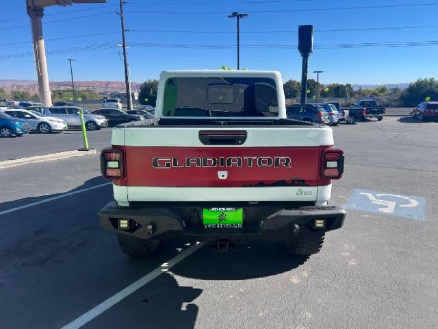 2021 Bright White Clearcoat /Red Jeep Gladiator Rubicon 4X4 (1C6JJTBG1ML) with an 3.6L V-6 DOHC engine, AUTOMATIC transmission, located at 1865 East Red Hills Pkwy, St. George, 84770, (435) 628-0023, 37.120850, -113.543640 - Classy red and white Gladiator rubicon with lift and tires. Great condition and drives straight. Specs: GVWR: 6,250 lbs w/Max Tow Package LED LIGHTING GROUP - AD6 Includes Daytime Running Lamps LED Accents LED Park Turn Lamps Front LED Fog Lamps LED Premium Reflector Headlamps LED Taillamps SA - Photo#5