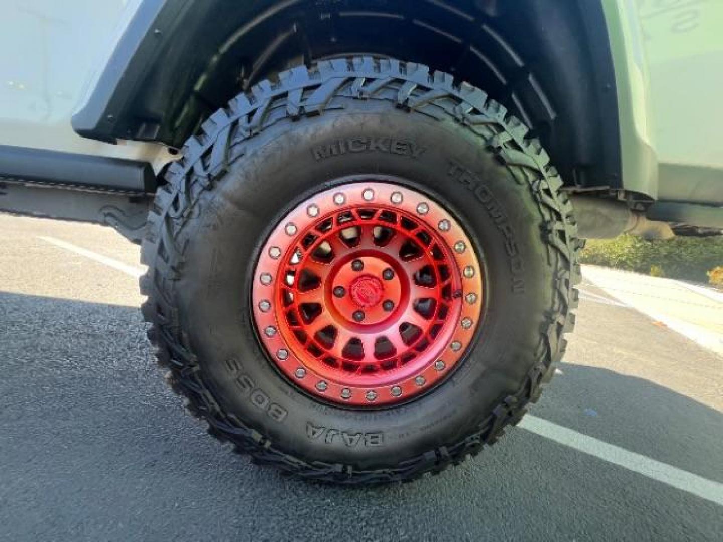 2021 Bright White Clearcoat /Red Jeep Gladiator Rubicon 4X4 (1C6JJTBG1ML) with an 3.6L V-6 DOHC engine, AUTOMATIC transmission, located at 1865 East Red Hills Pkwy, St. George, 84770, (435) 628-0023, 37.120850, -113.543640 - Classy red and white Gladiator rubicon with lift and tires. Great condition and drives straight. Specs: GVWR: 6,250 lbs w/Max Tow Package LED LIGHTING GROUP - AD6 Includes Daytime Running Lamps LED Accents LED Park Turn Lamps Front LED Fog Lamps LED Premium Reflector Headlamps LED Taillamps SA - Photo#8