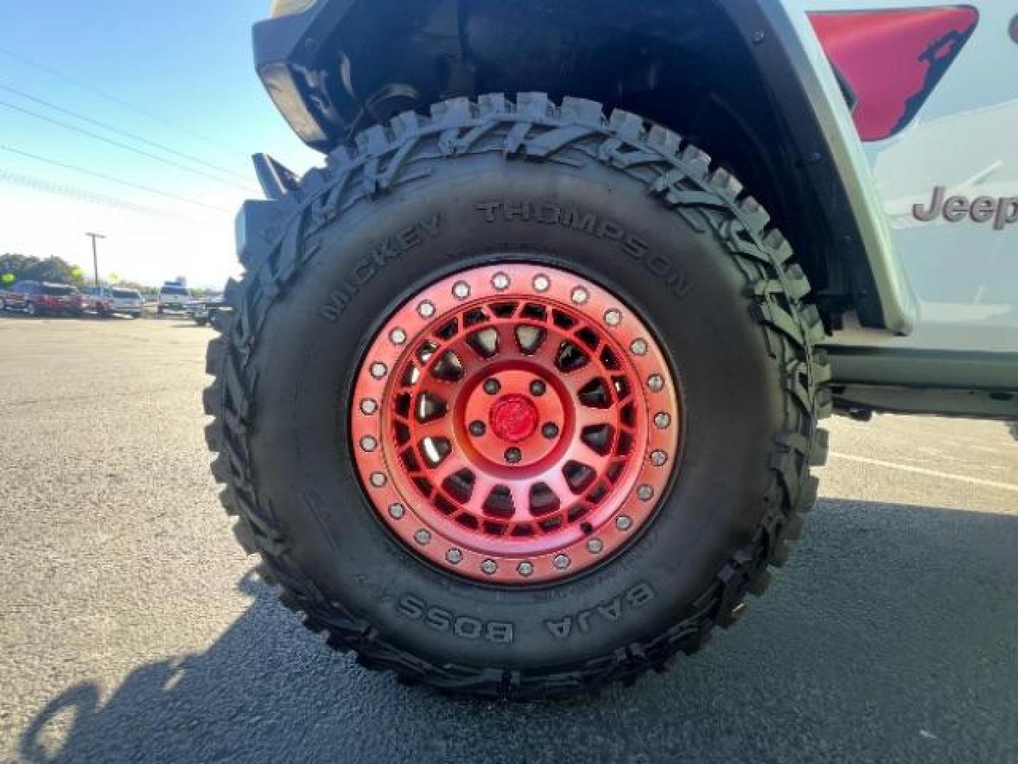 2021 Bright White Clearcoat /Red Jeep Gladiator Rubicon 4X4 (1C6JJTBG1ML) with an 3.6L V-6 DOHC engine, AUTOMATIC transmission, located at 1865 East Red Hills Pkwy, St. George, 84770, (435) 628-0023, 37.120850, -113.543640 - Classy red and white Gladiator rubicon with lift and tires. Great condition and drives straight. Specs: GVWR: 6,250 lbs w/Max Tow Package LED LIGHTING GROUP - AD6 Includes Daytime Running Lamps LED Accents LED Park Turn Lamps Front LED Fog Lamps LED Premium Reflector Headlamps LED Taillamps SA - Photo#11