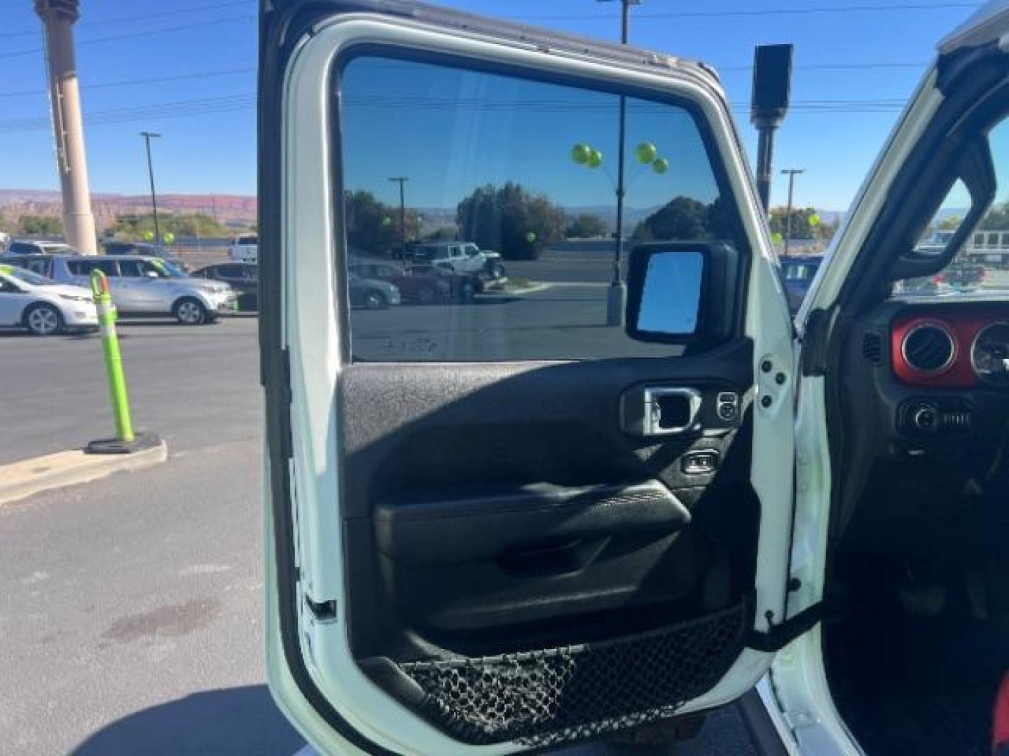 2021 Bright White Clearcoat /Red Jeep Gladiator Rubicon 4X4 (1C6JJTBG1ML) with an 3.6L V-6 DOHC engine, AUTOMATIC transmission, located at 1865 East Red Hills Pkwy, St. George, 84770, (435) 628-0023, 37.120850, -113.543640 - Classy red and white Gladiator rubicon with lift and tires. Great condition and drives straight. Specs: GVWR: 6,250 lbs w/Max Tow Package LED LIGHTING GROUP - AD6 Includes Daytime Running Lamps LED Accents LED Park Turn Lamps Front LED Fog Lamps LED Premium Reflector Headlamps LED Taillamps SA - Photo#12
