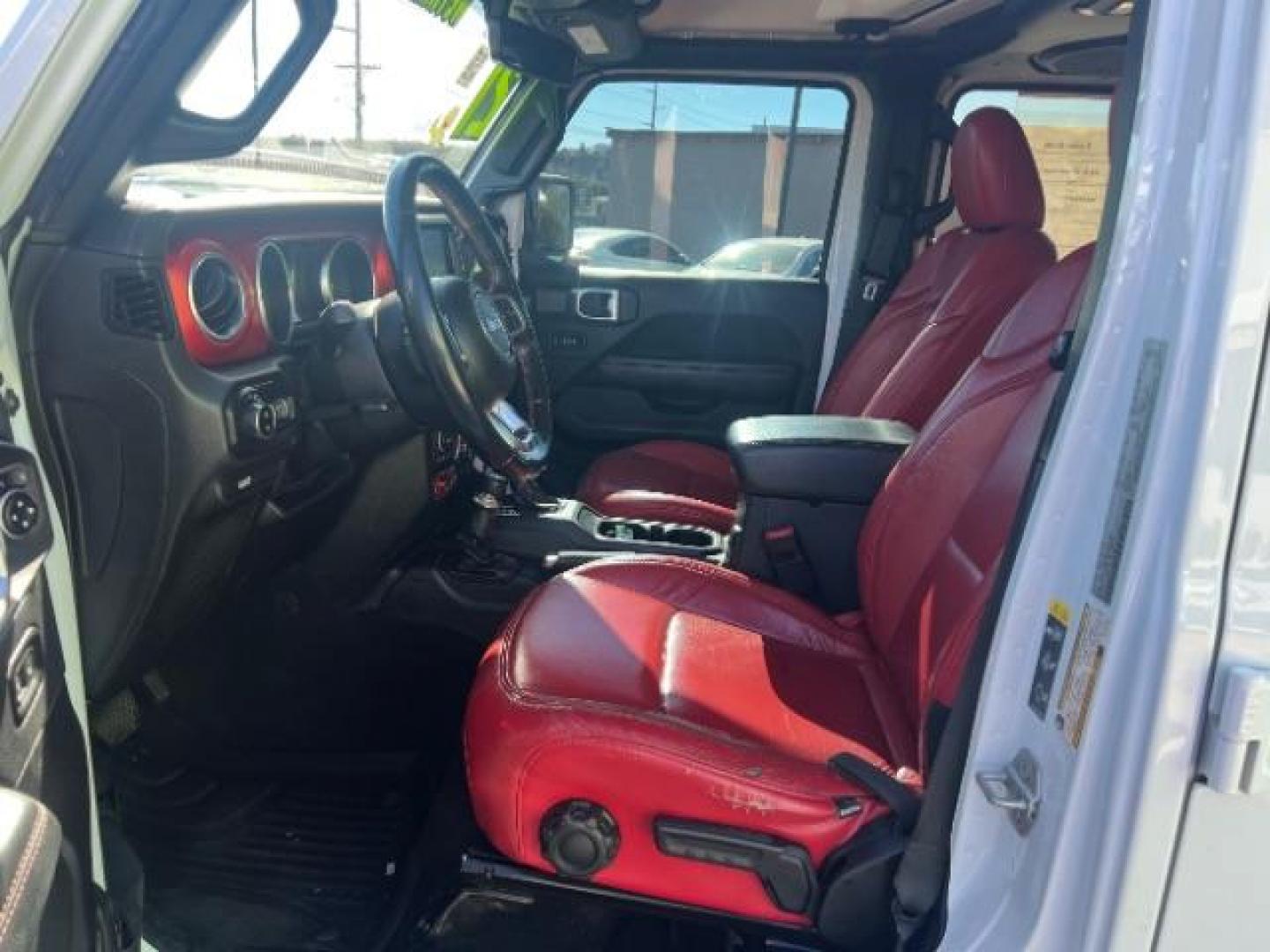 2021 Bright White Clearcoat /Red Jeep Gladiator Rubicon 4X4 (1C6JJTBG1ML) with an 3.6L V-6 DOHC engine, AUTOMATIC transmission, located at 1865 East Red Hills Pkwy, St. George, 84770, (435) 628-0023, 37.120850, -113.543640 - Classy red and white Gladiator rubicon with lift and tires. Great condition and drives straight. Specs: GVWR: 6,250 lbs w/Max Tow Package LED LIGHTING GROUP - AD6 Includes Daytime Running Lamps LED Accents LED Park Turn Lamps Front LED Fog Lamps LED Premium Reflector Headlamps LED Taillamps SA - Photo#14
