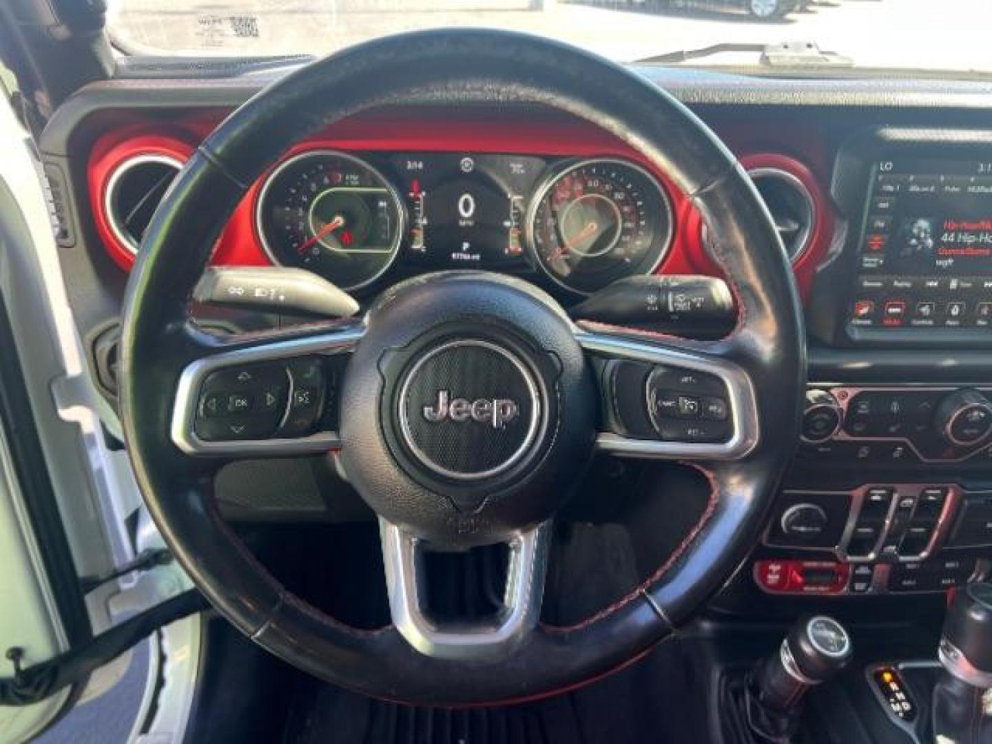 2021 Bright White Clearcoat /Red Jeep Gladiator Rubicon 4X4 (1C6JJTBG1ML) with an 3.6L V-6 DOHC engine, AUTOMATIC transmission, located at 1865 East Red Hills Pkwy, St. George, 84770, (435) 628-0023, 37.120850, -113.543640 - Classy red and white Gladiator rubicon with lift and tires. Great condition and drives straight. Specs: GVWR: 6,250 lbs w/Max Tow Package LED LIGHTING GROUP - AD6 Includes Daytime Running Lamps LED Accents LED Park Turn Lamps Front LED Fog Lamps LED Premium Reflector Headlamps LED Taillamps SA - Photo#15